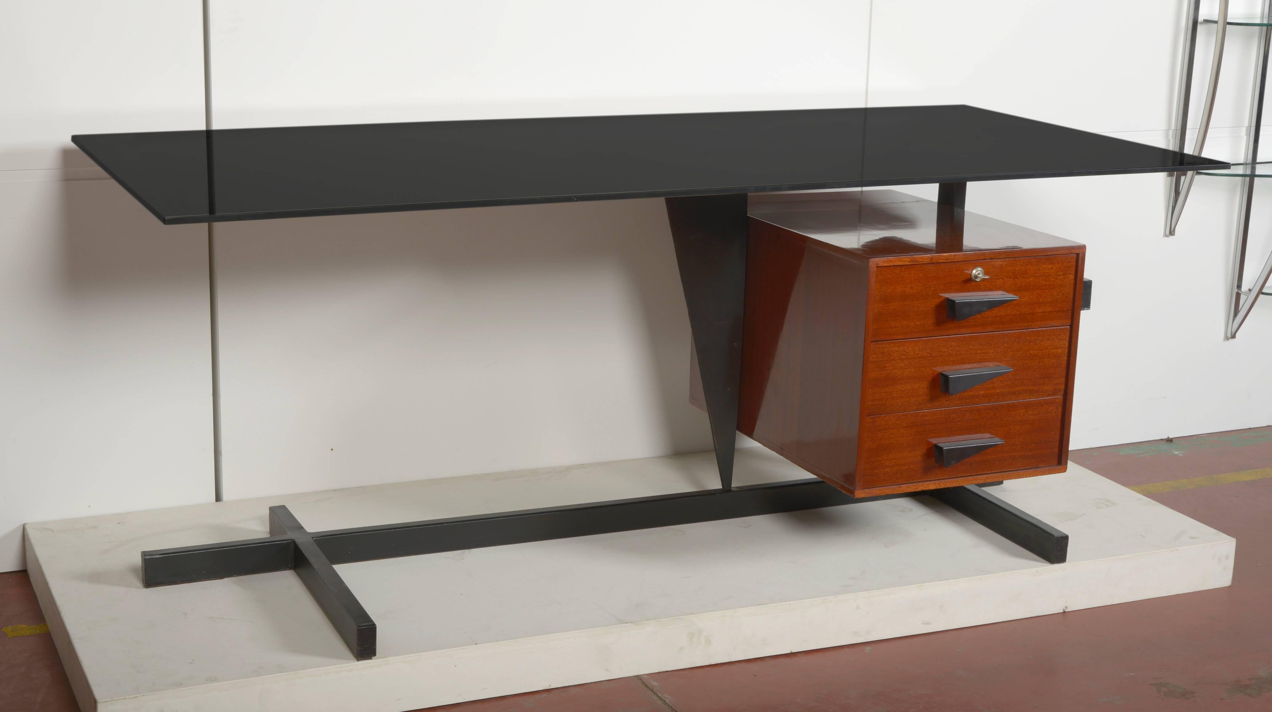 1960's mahogany and painted metal architect desk.
Black glass.