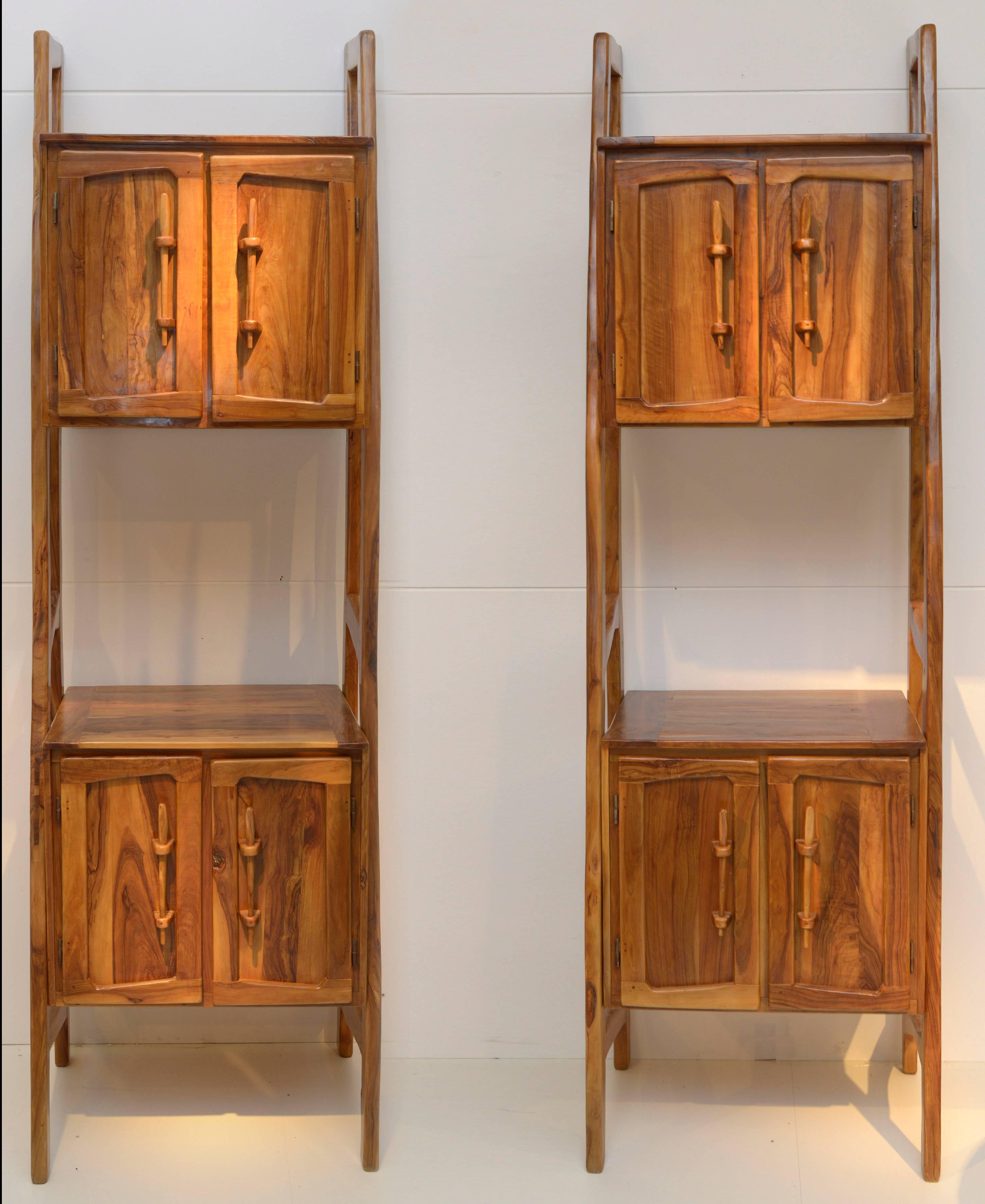 Pair of outstanding Italian, 1960s solid olive wood cabinets
four doors, shelves.