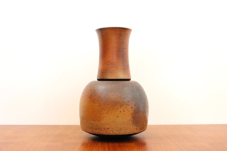 Architectural German studio pottery vase attributed to Monika Geulig.

____

We're offering our customers free domestic shipping on all items during the current health crisis. We will also offer free or deeply discounted international shipping.