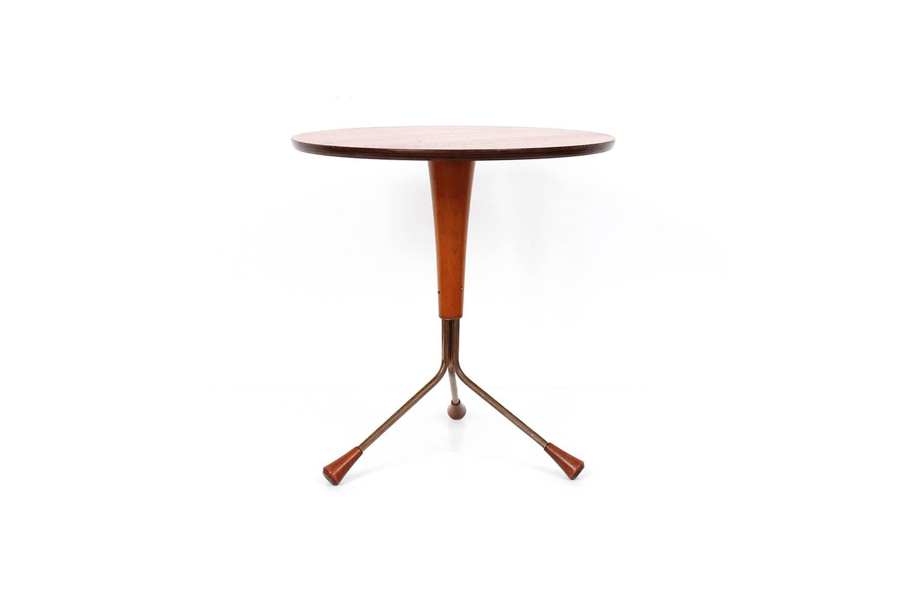 Teak tripod style side table designed by Albert Larsson for Alberts of Sweden. Teak top with brass legs and teak feet. Well-proportioned table. Branded to underside.