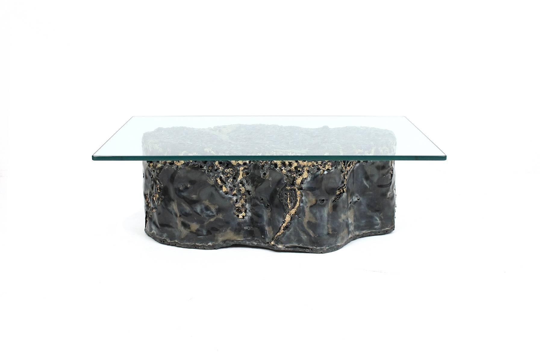 Artist made bronze coffee table by Edward Garfinkle. This sculpted and torched bronze table was executed in 1970 and is titled “Volcanic I”. Its biomorphic shape and execution is reminiscent of similar tables by Silas Seandel and Karl Springer.
