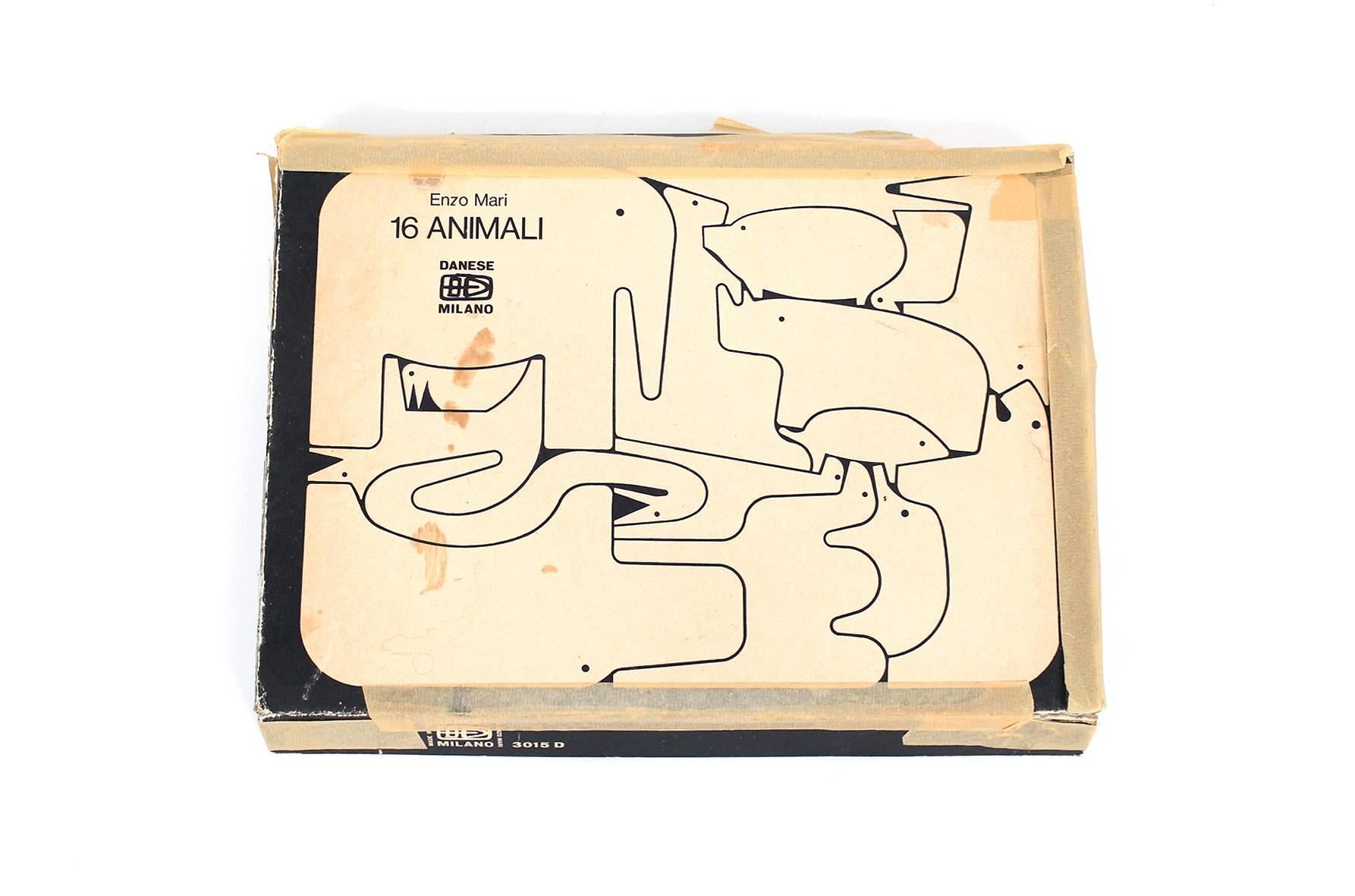 A graphic puzzle in its original box designed by noted Italian designer Enzo Mari for Danese. Puzzle material is an interesting 