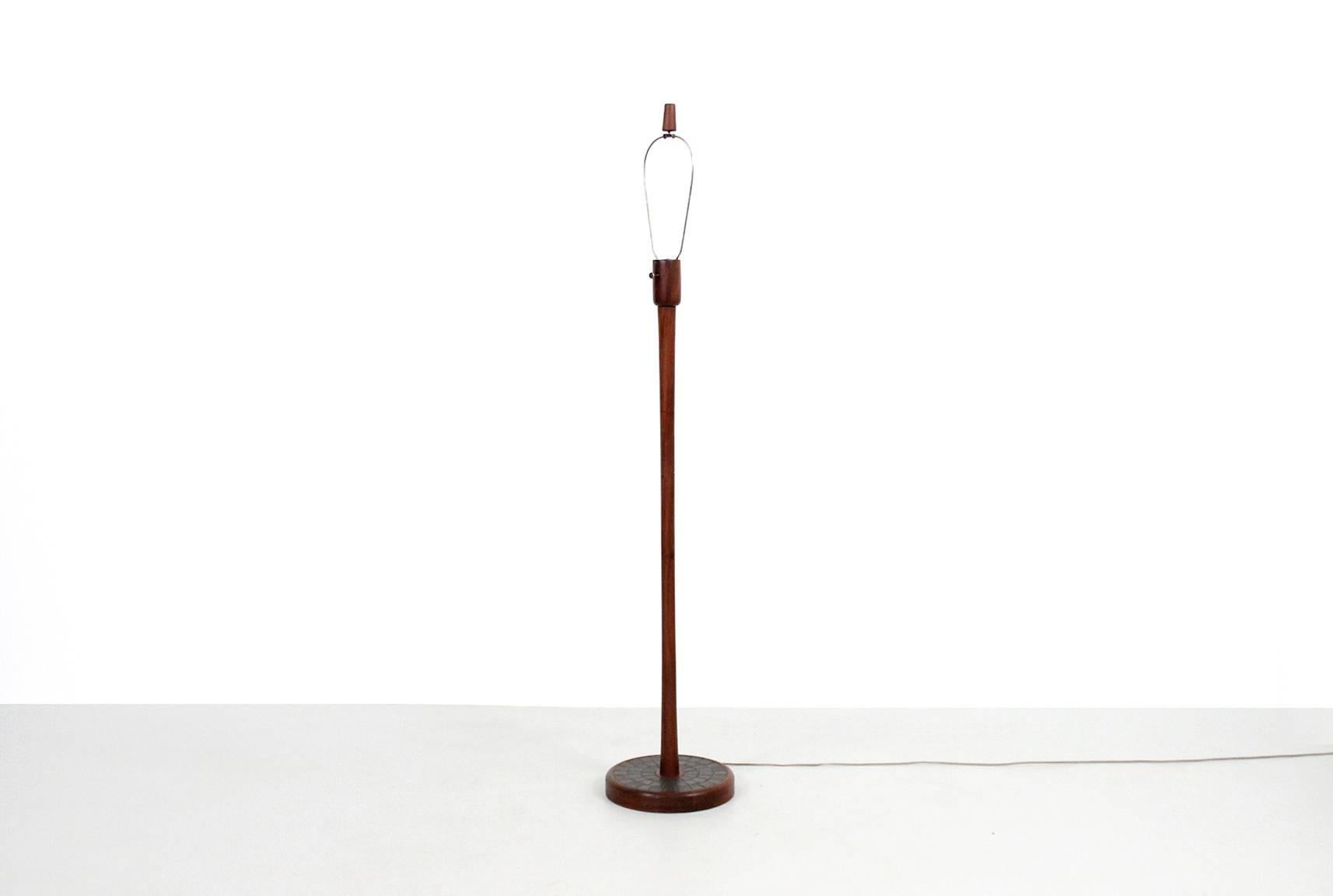Jane and Gordon Martz for Marshall Studios walnut floor lamp with graphic ceramic tile detail on base. Dimensions below are with shade pictured. Shade not included.
    