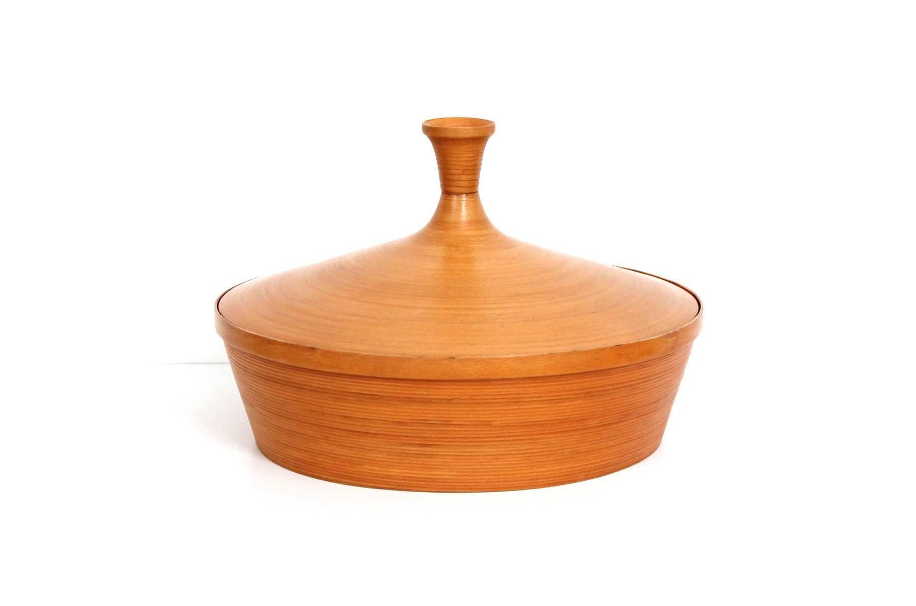 Oversized lidded vessel or box made from meticulously laminated birch. We believe this stunning piece to be of Scandinavian origin, possibly produced in Finland. Perfect for storing small objects, remotes, or periodicals.

____

We're offering our