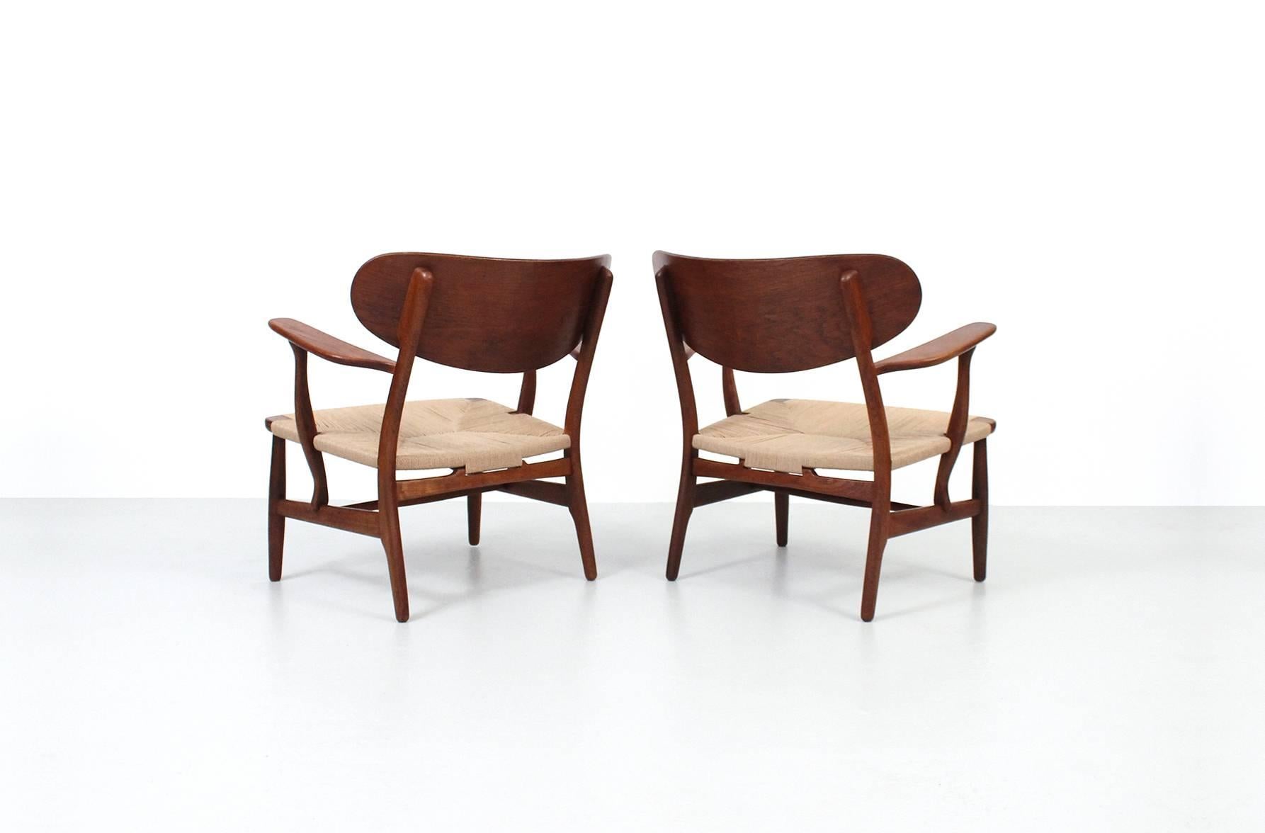 Danish Pair of CH22 Lounge Chairs by Hans Wegner