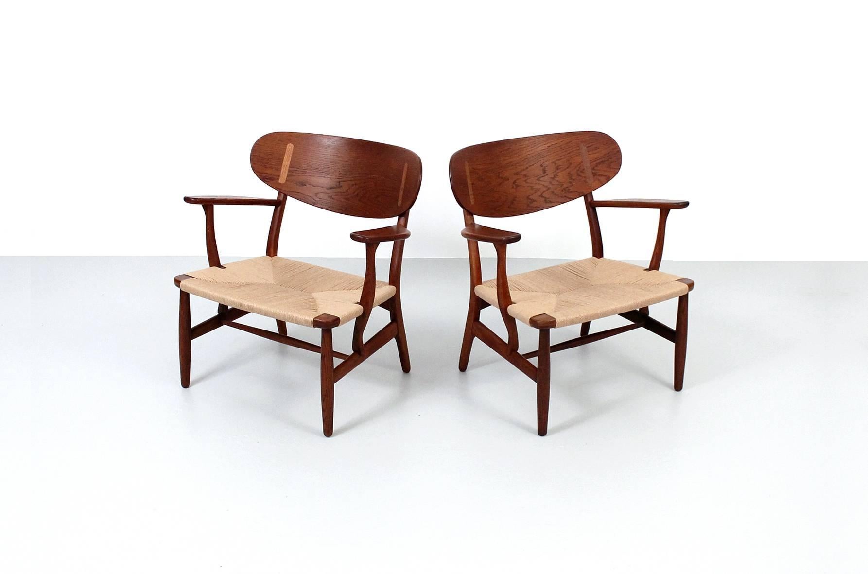 Pair of CH22 Lounge Chairs by Hans Wegner In Excellent Condition In Waltham, MA