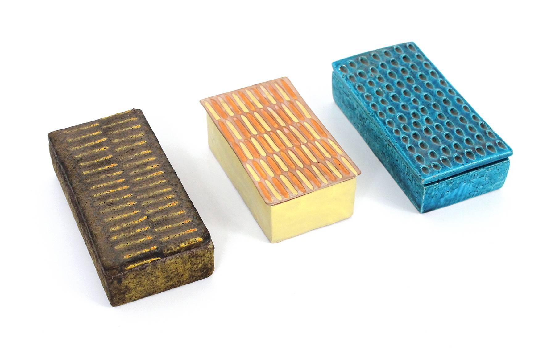 Collection of three ceramics boxes designed by Bitossi for Raymor. Wonderful glazes and textured designs. Signed with the 