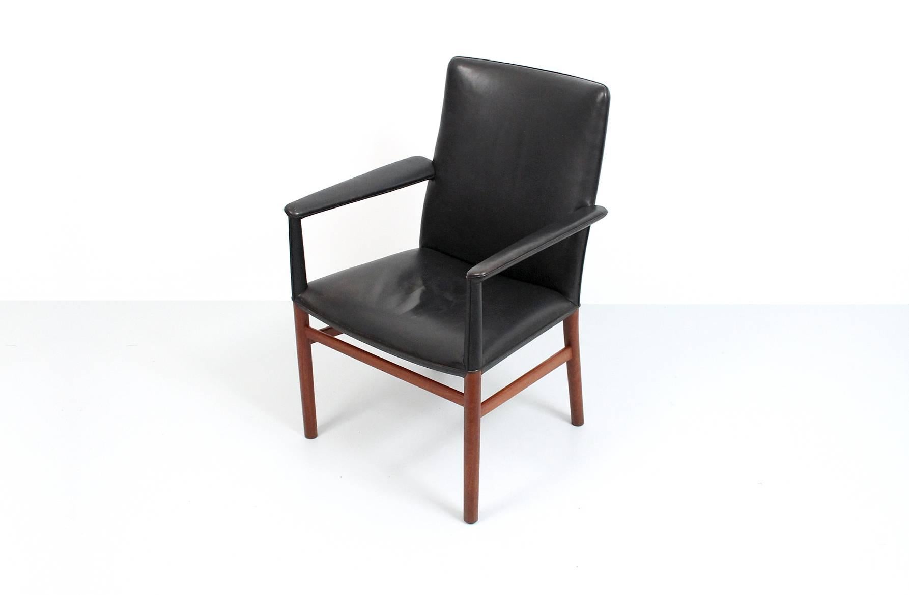 Rare original leather and teak armchair attributed to Ejner Larsen & Aksel Bender Madsen. Made by Danish cabinetmaker Ludvig Pontoppidan.
 