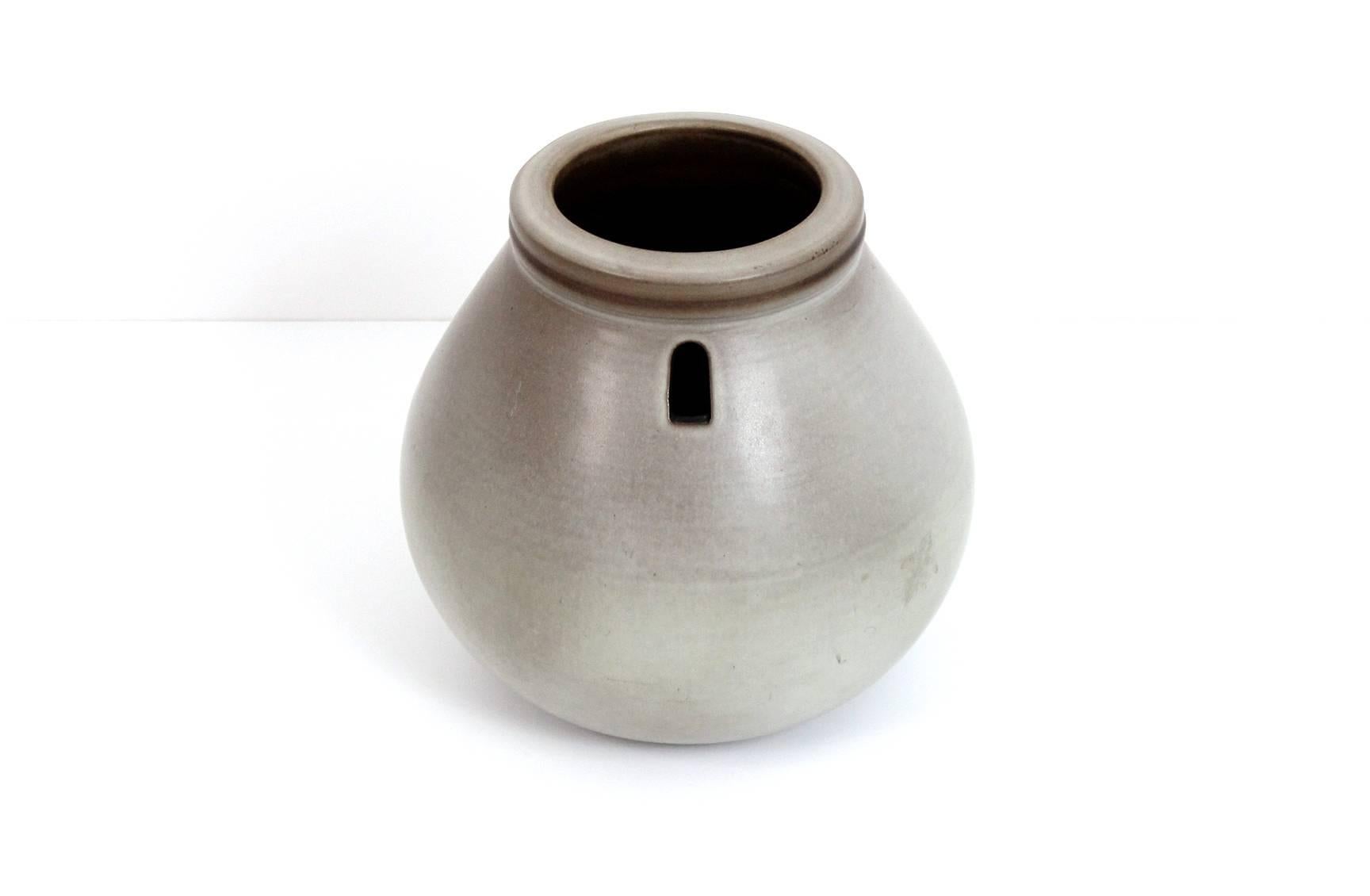 Architectural and large Studio Pottery vase by respected California potter Rupert Deese. Signed with his conjoined RD stamp.

____

We're offering our customers free domestic shipping on all items during the current health crisis. We will also offer