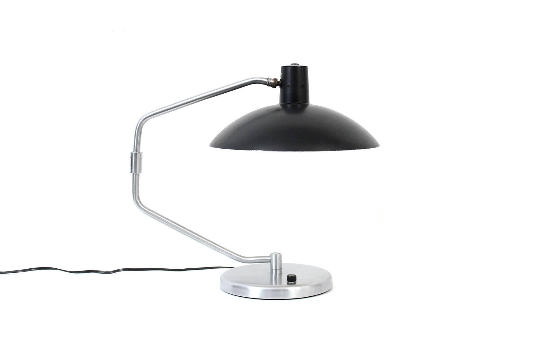 Articulating desk lamp designed by Clay Michie for Knoll. This was the first piece of lighting designed for Knoll.