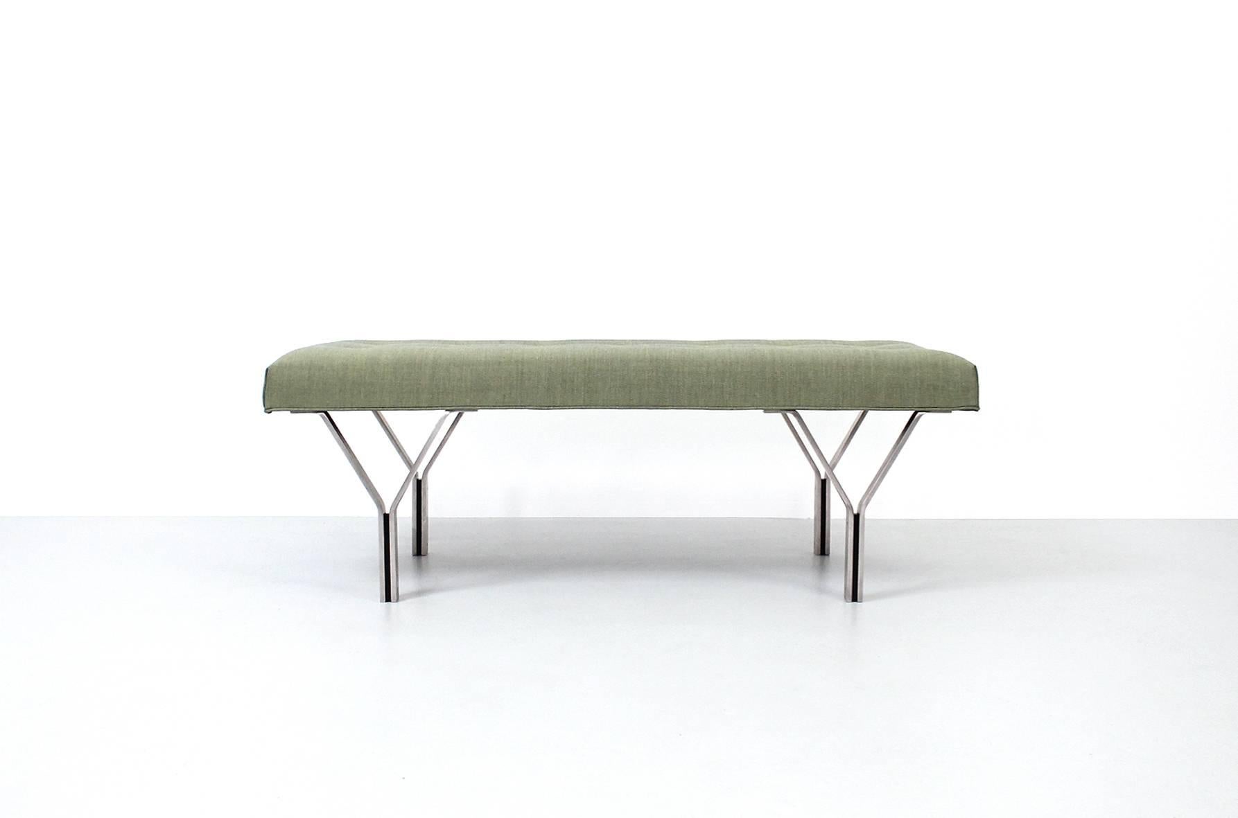 Architectural upholstered bench with steel Y-frame legs. Great scale for a variety of applications. Made by Cumberland Furniture. Recently upholstered in Maharam fabric.
 