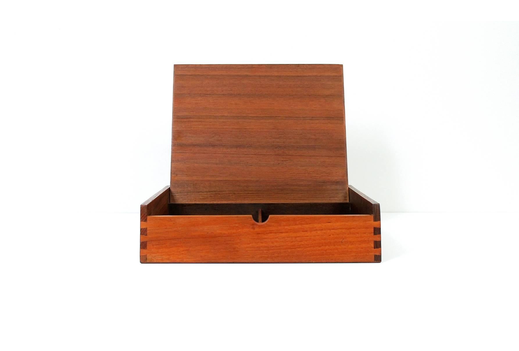 Scandinavian lift top teak jewelry box. Excellent design and craftsmanship in this example. Unknown maker.