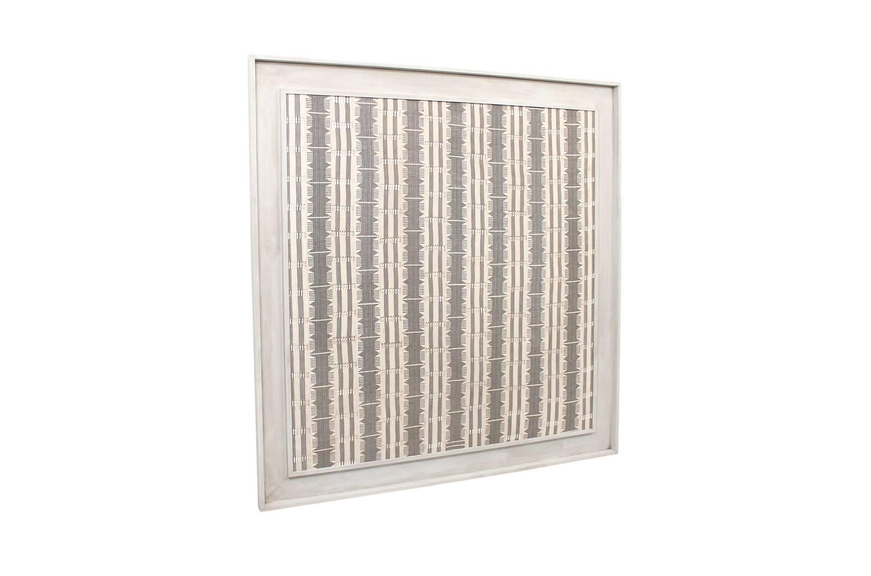 Impressive large-scale modernist textile in custom frame. This woven piece is reminiscent of work by Jack Lenor Larsen and British fibre artist Peter Collingwood.
     