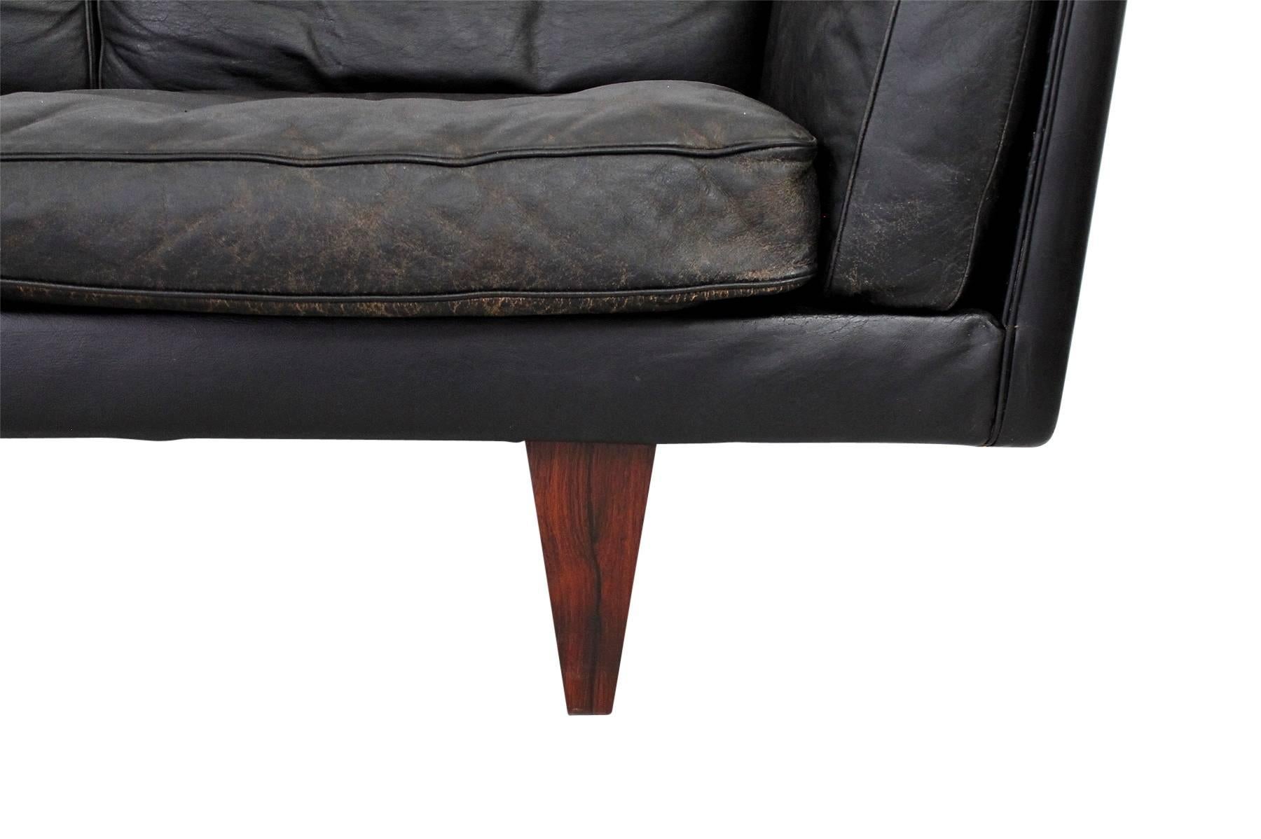 Leather and Rosewood Sofa by Illum Wikkelso 2