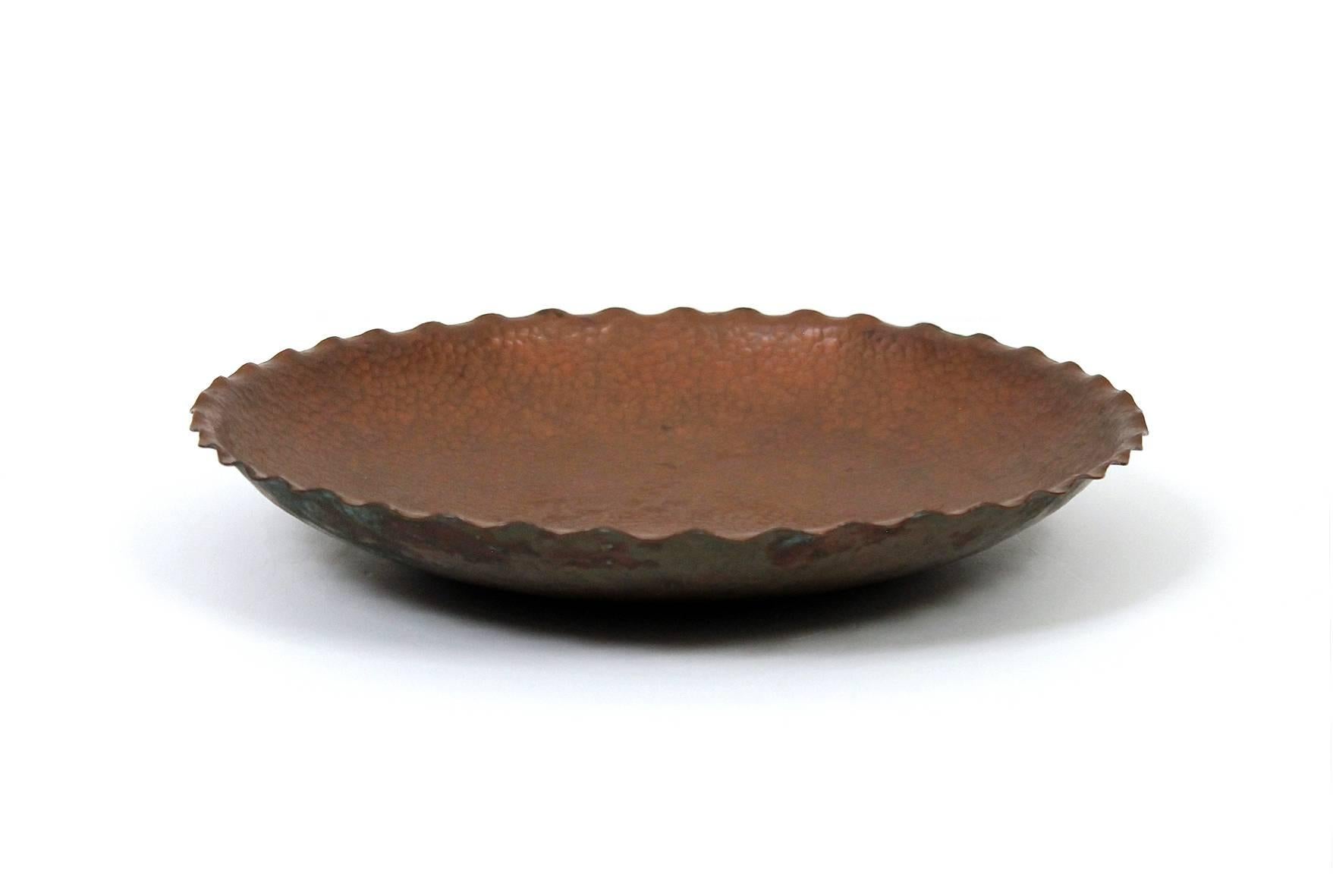 Hand-hammered signed Austrian Secessionist bowl with a scalloped edge. Signed and stamped by the maker underneath. Late 19th-early 20th century.

____

We're offering our customers free domestic shipping on all items during the current health