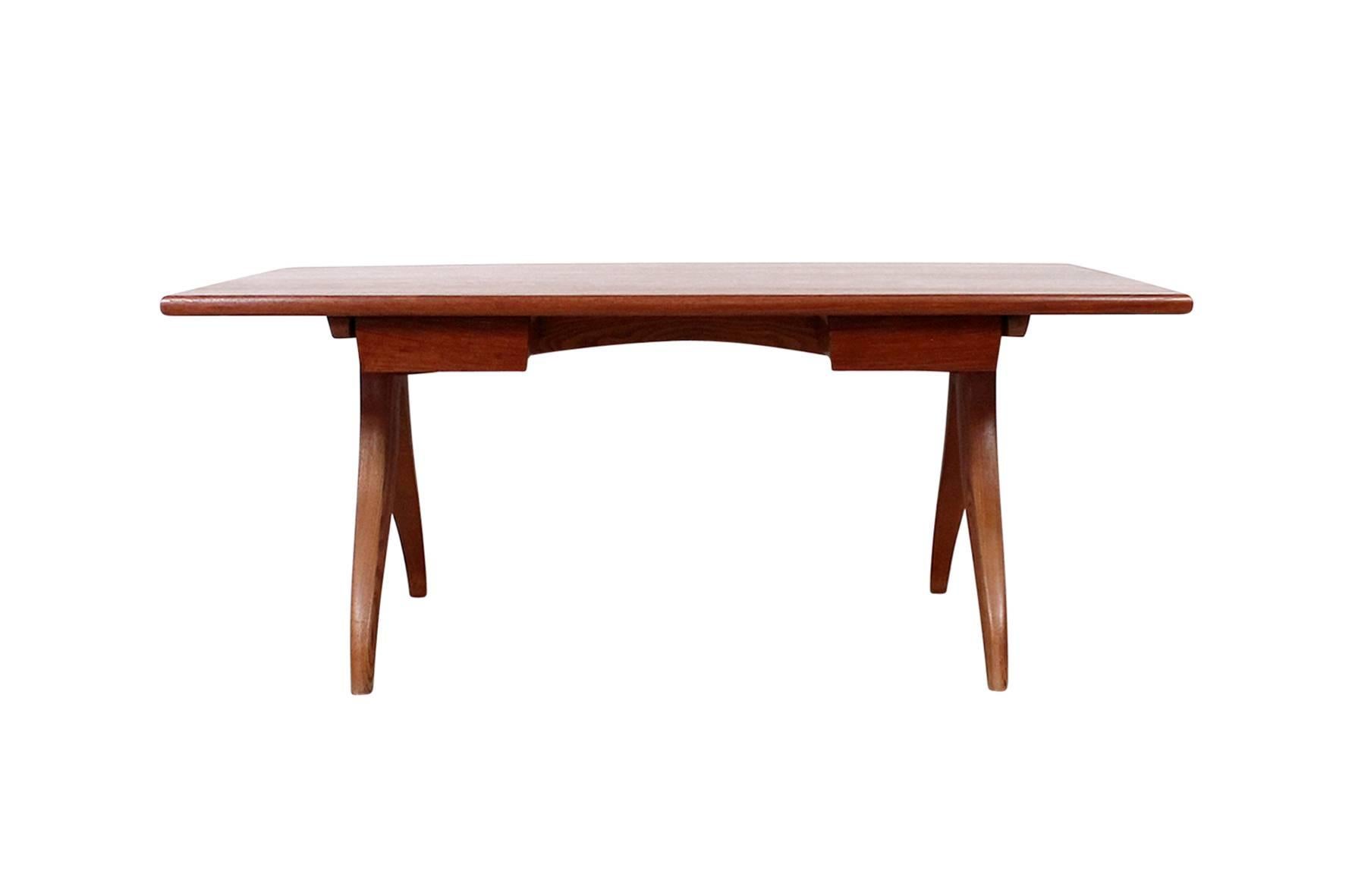 Rare studio furniture desk in fruitwood by Jere Osgood. Desk features a solid top with two slide out drawers and sculptural base. Signed and dated to 1976. Osgood's work can be seen in renowned collections including the Museum of Fine Arts, Boston,