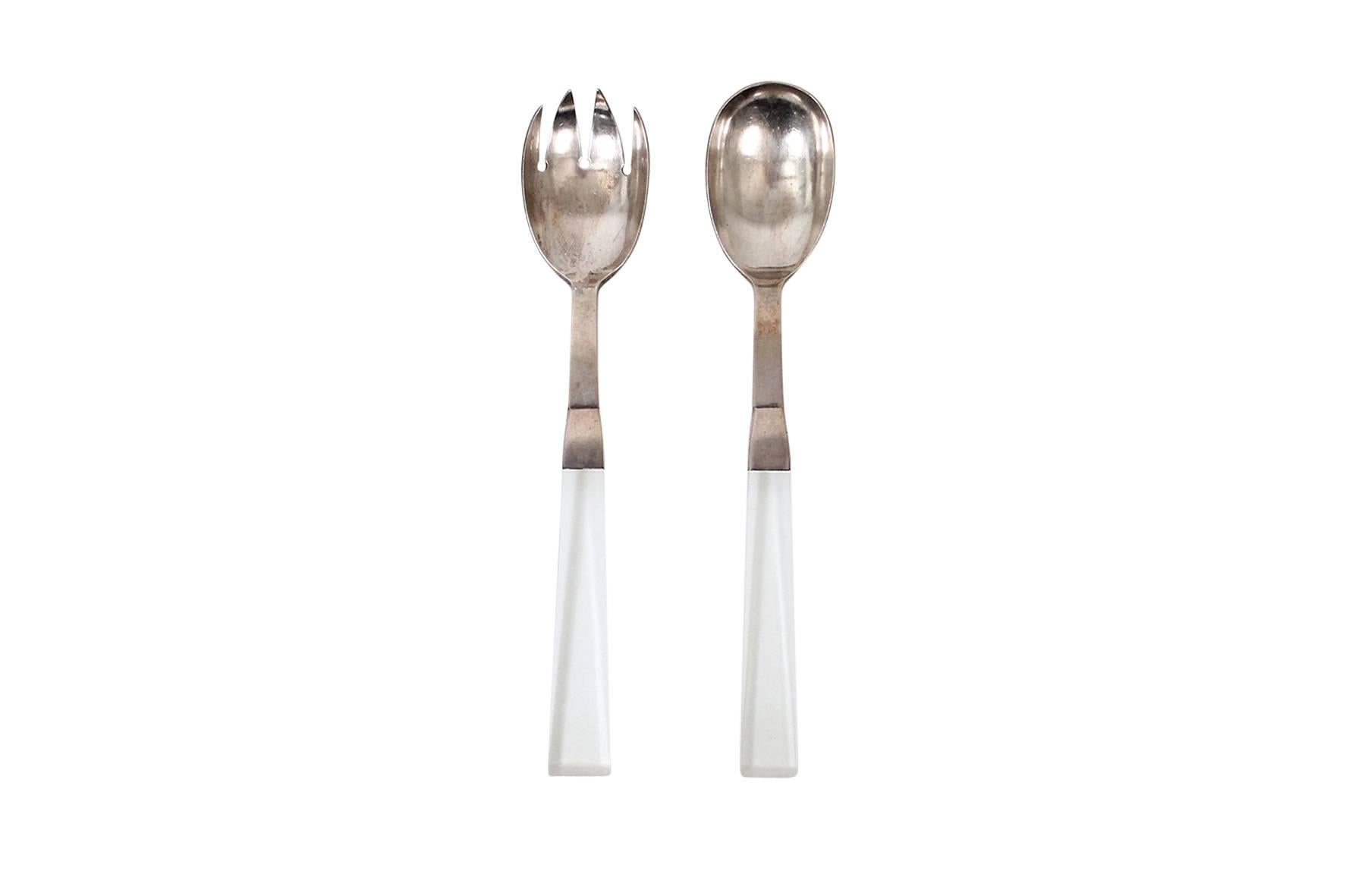Early Modernist serving pieces in sterling silver with lucite handles by noted California silversmith Porter Blanchard. Each utensil stamped 
