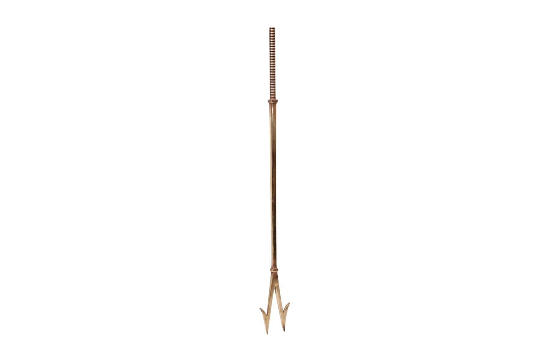 Solid brass fireplace tool designed by Robert Swanson, Pipsan Saarinen-Swanson, and Eliel Saarinen for the Swanson Saarinen Group. This design is part of a sought after series that was produced by the American company in the 1940s. Elegant early