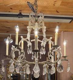 Lustre de château à 8 lumières de style Louis XV en fer et cristal de roche, signé Dennis & Leen