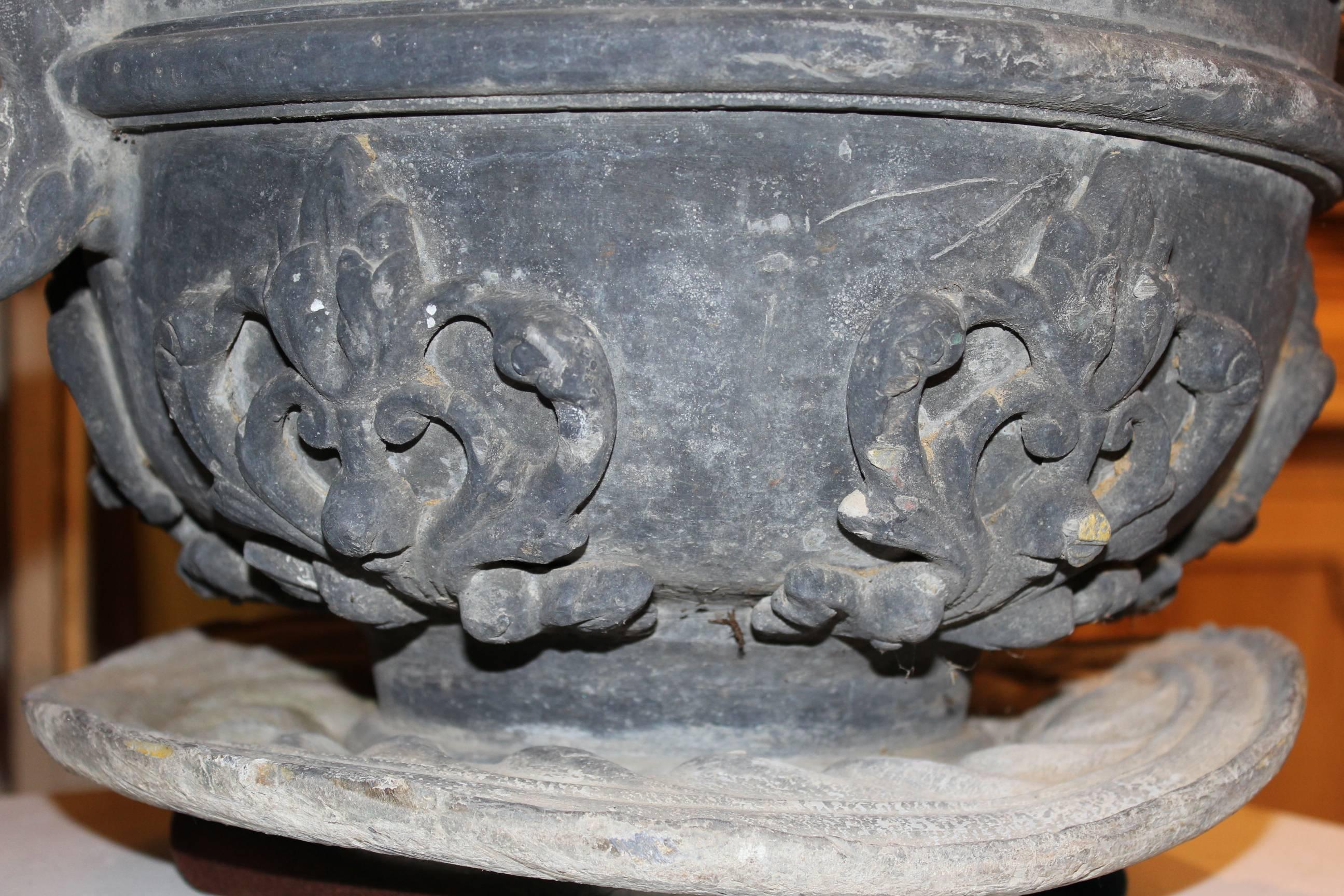 Pair of Lead Urns with Figural Handles and Cherub Decoration 4