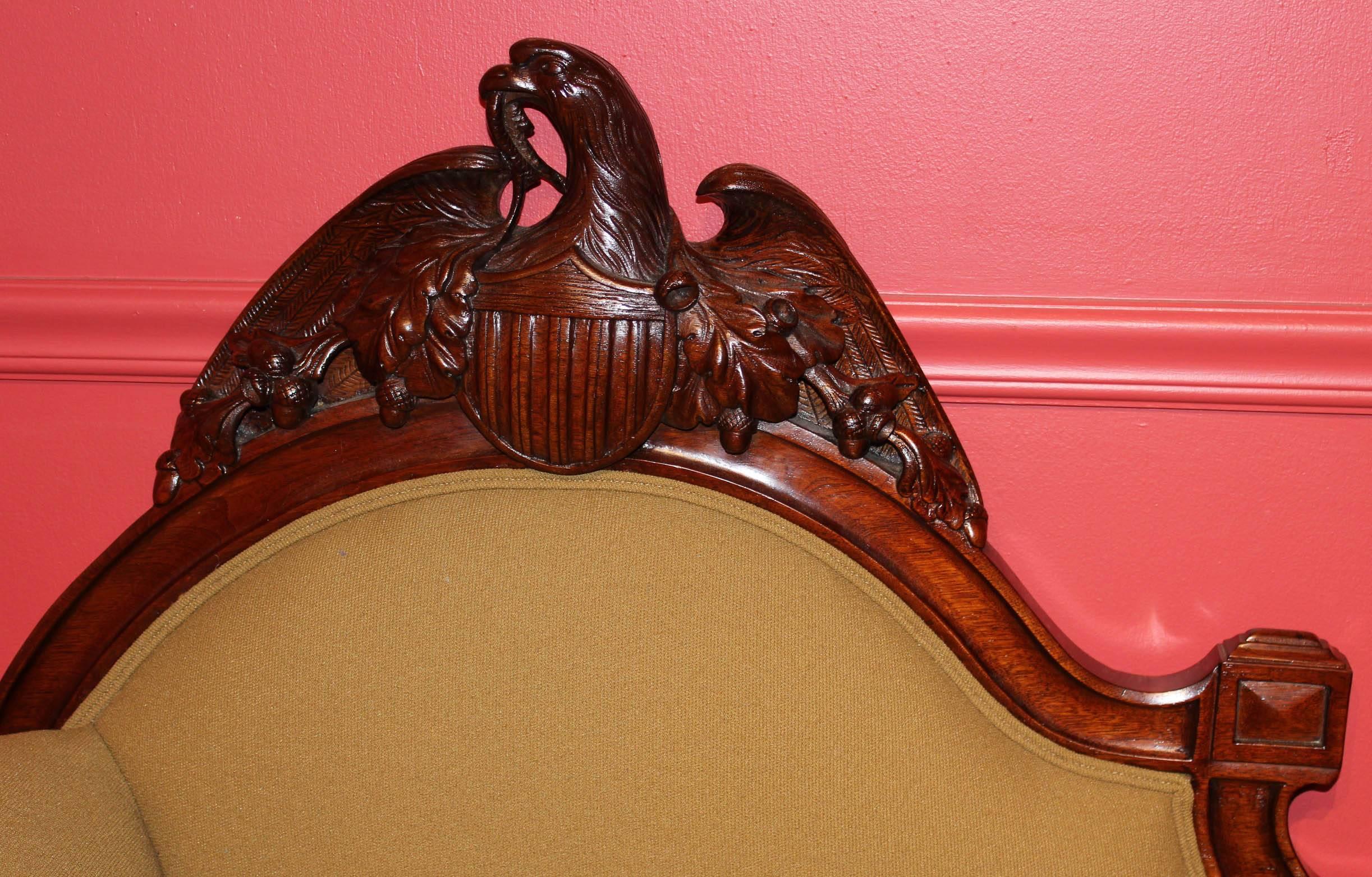 Fine and rare American Victorian eagle carved walnut Recamier, New York or Philadelphia, circa 1876. Most likely made for the Centennial celebration of 1876. Professionally refinished and upholstered. Supported on brass casters.