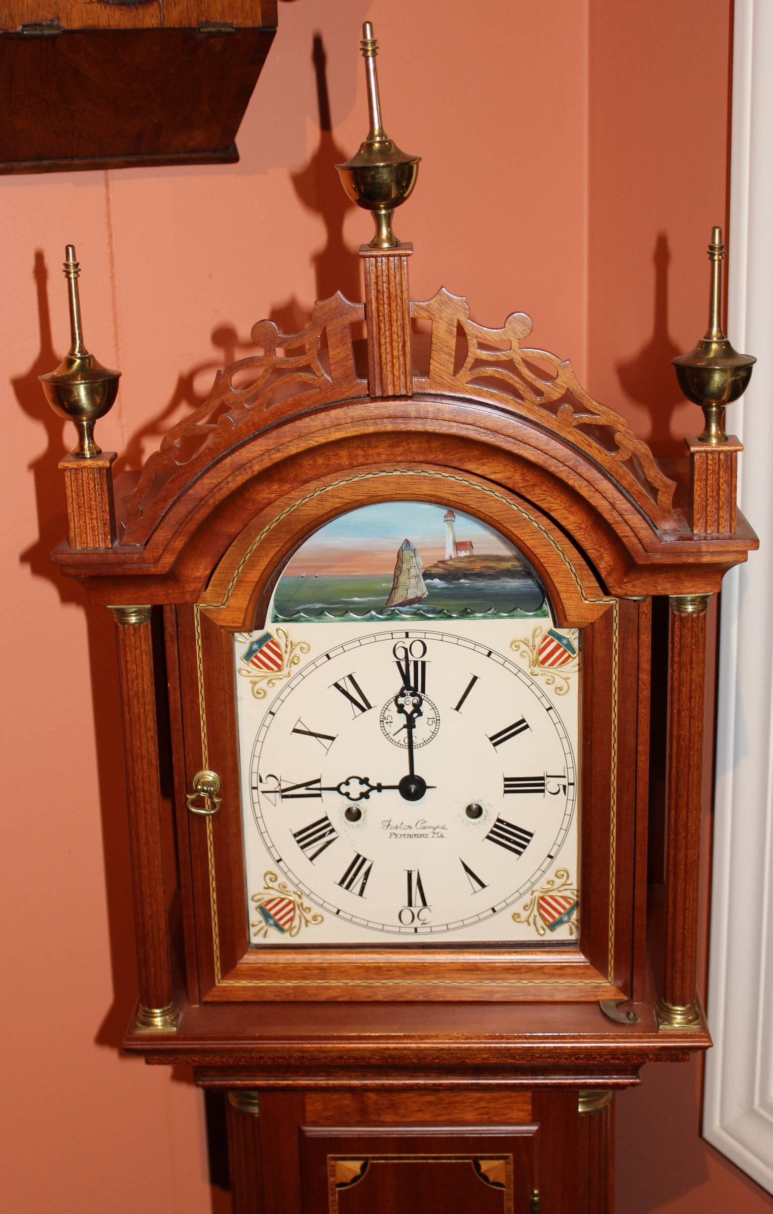 A wonderfully made mahogany case grandmother tall clock by well known clockmaker Foster S. Campos (1926-2007.) Foster Campos created some of the finest replicas of classic early American timepieces that are available today. Handpainted polychrome