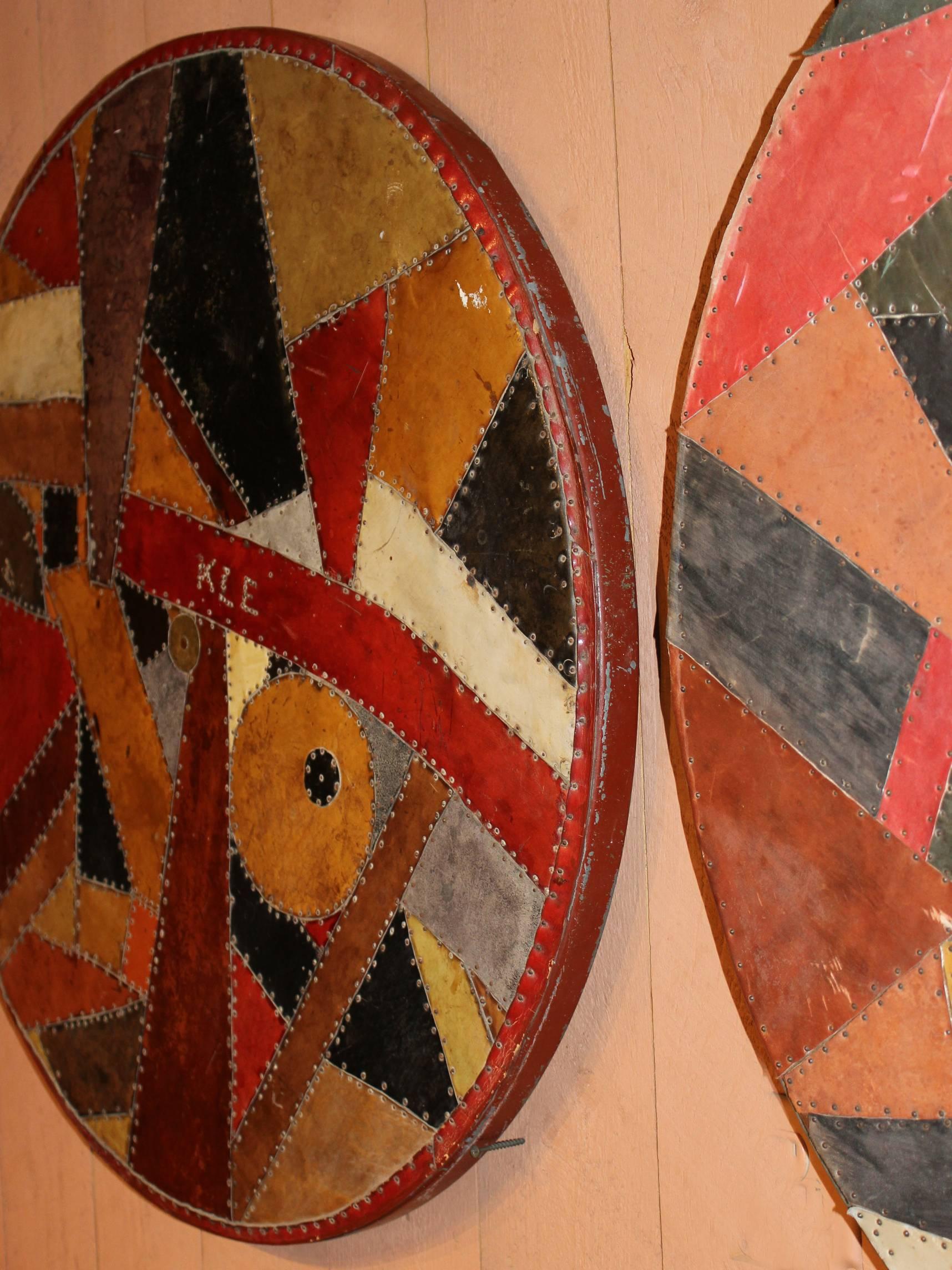 Pair of Leather Piece Work Covered Wooden Roundels 1