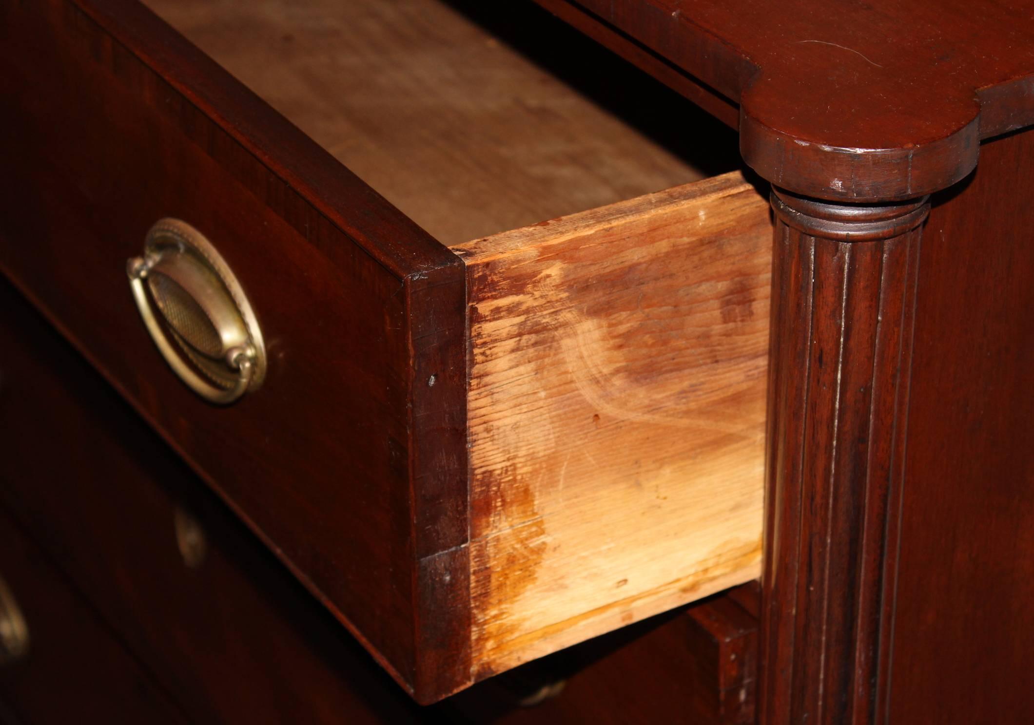 Carved American Sheraton Mahogany Four-Drawer Chest with Ovolu Corners, circa 1820