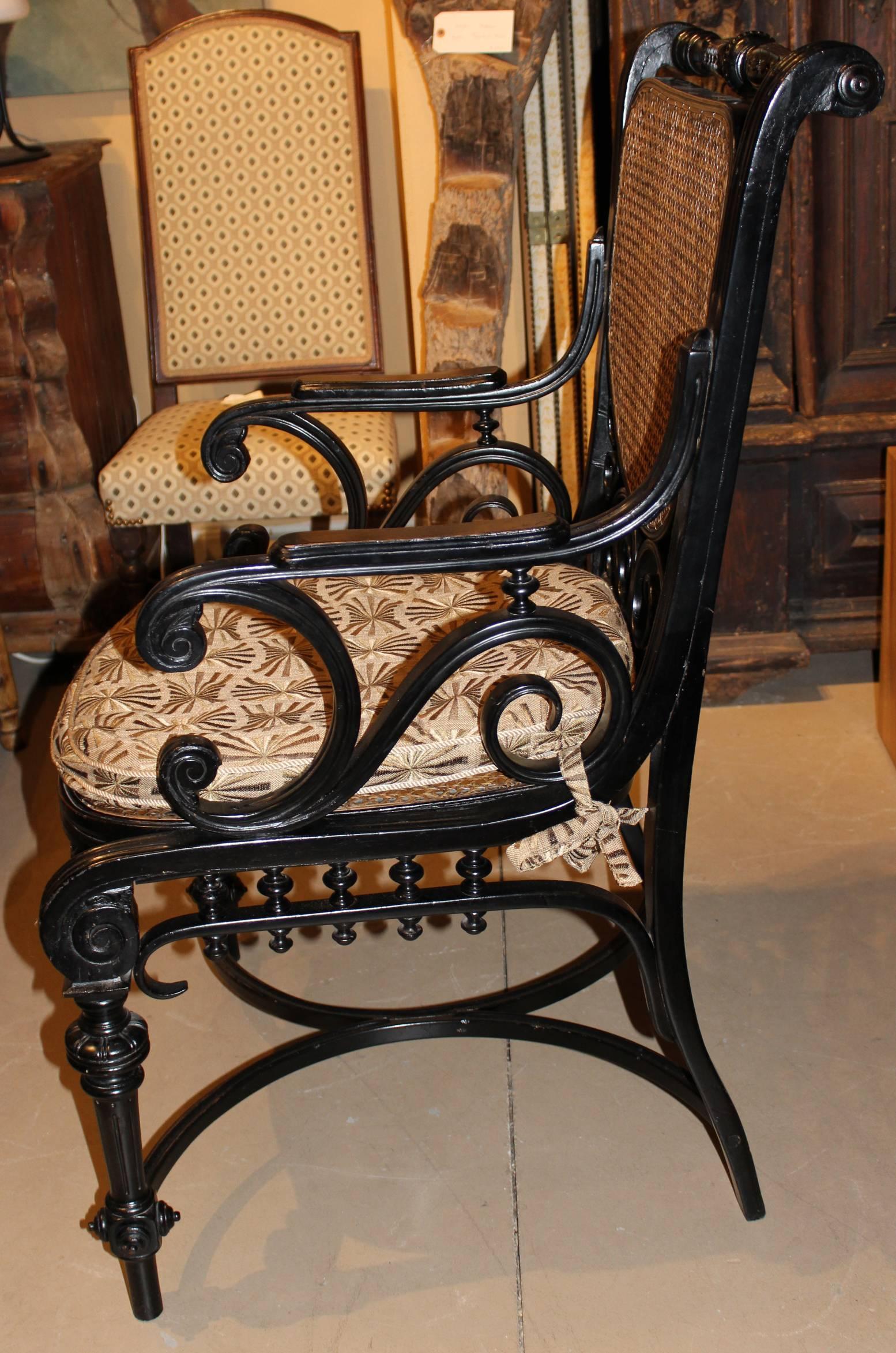 Aesthetic Movement Anglo Raj Ebonized Bentwood Armchair with Caned Seat and Back