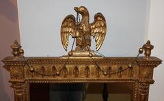 Pair of Classical Style Giltwood Mirrors with Carved Eagles