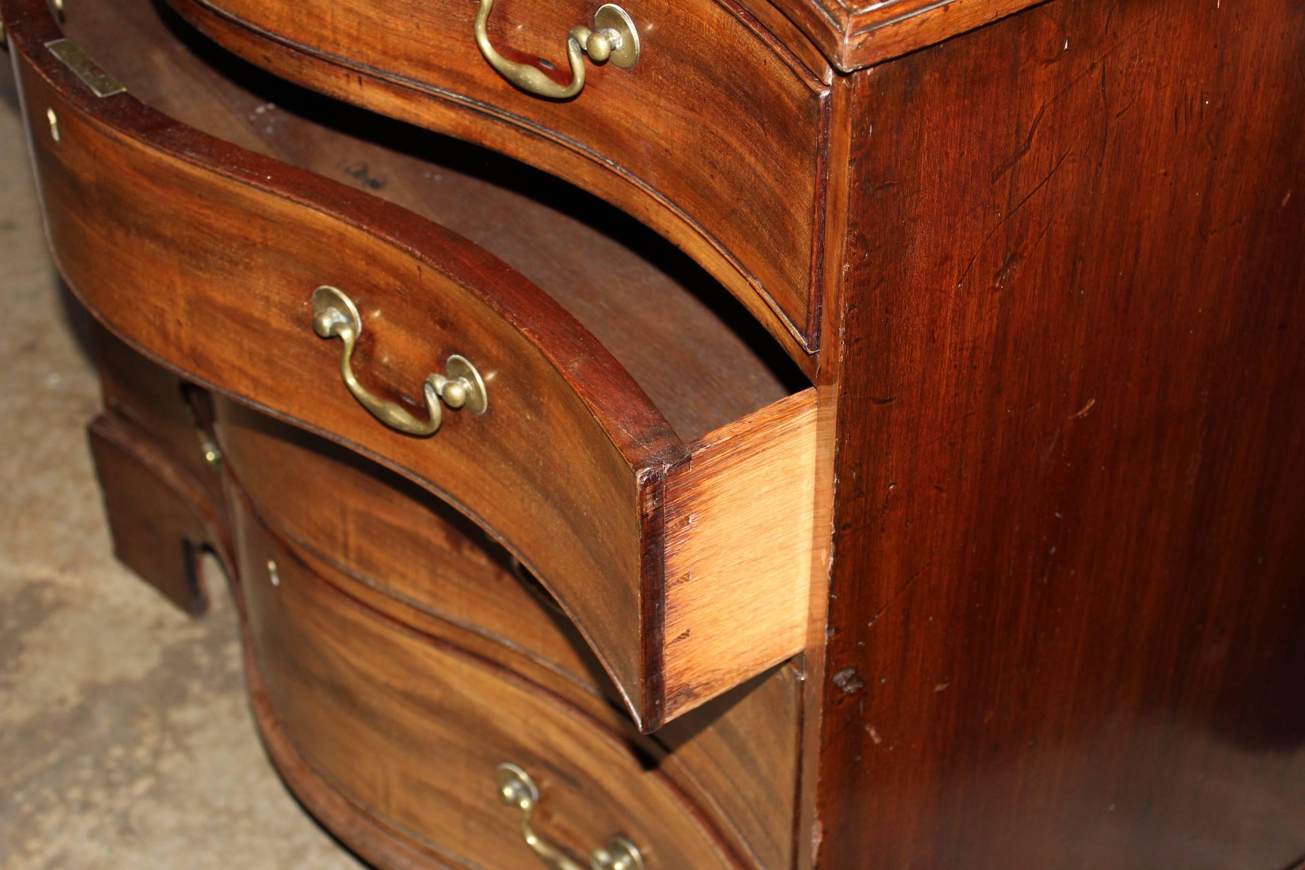 Carved 18th Century Georgian Mahogany Four-Drawer Serpentine Chest