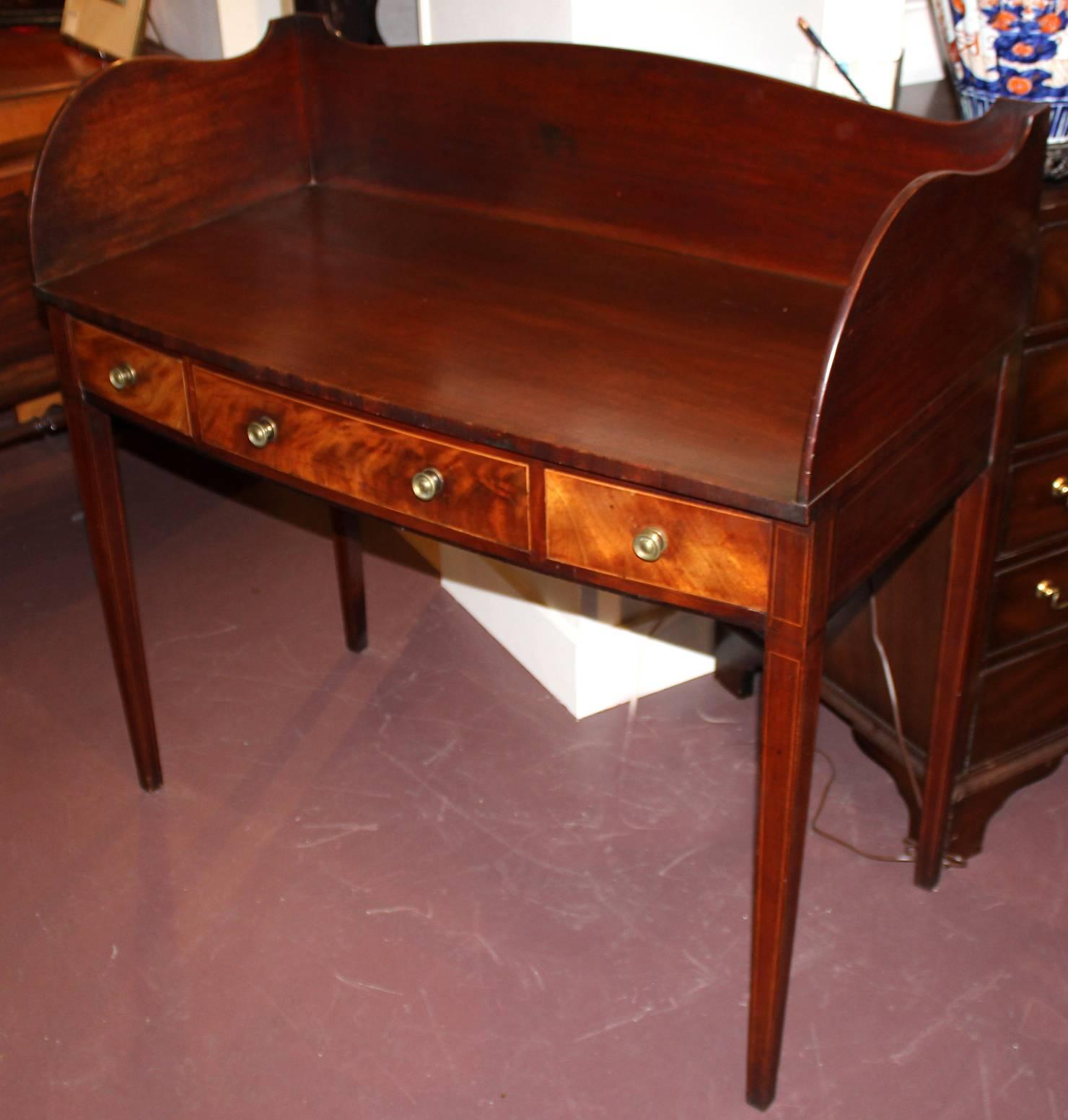 Carved 19th Century English Mahogany Bow Front Server with Shaped Splash Rail