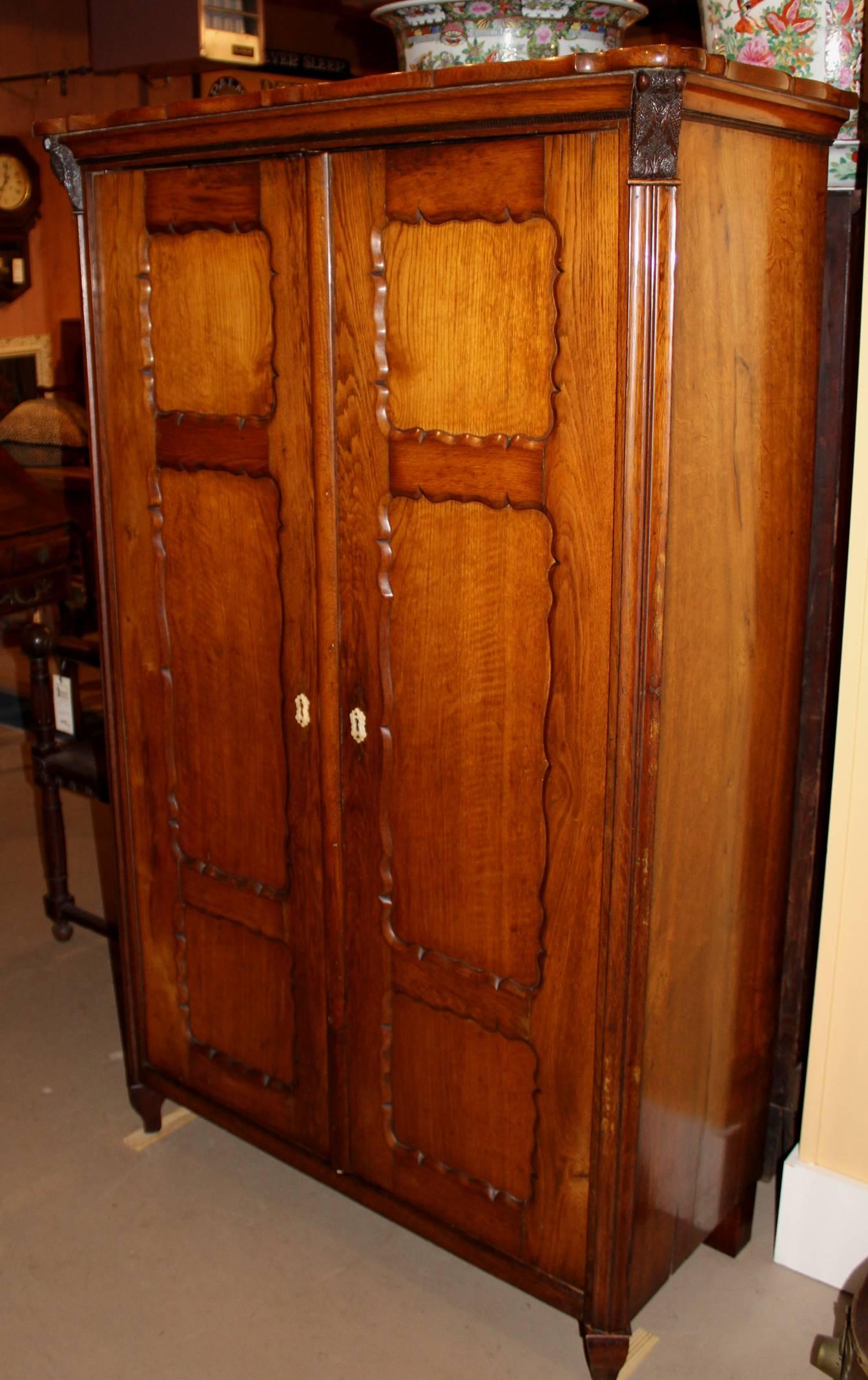 Carved Diminutive 19th Century French Fruitwood Armoire