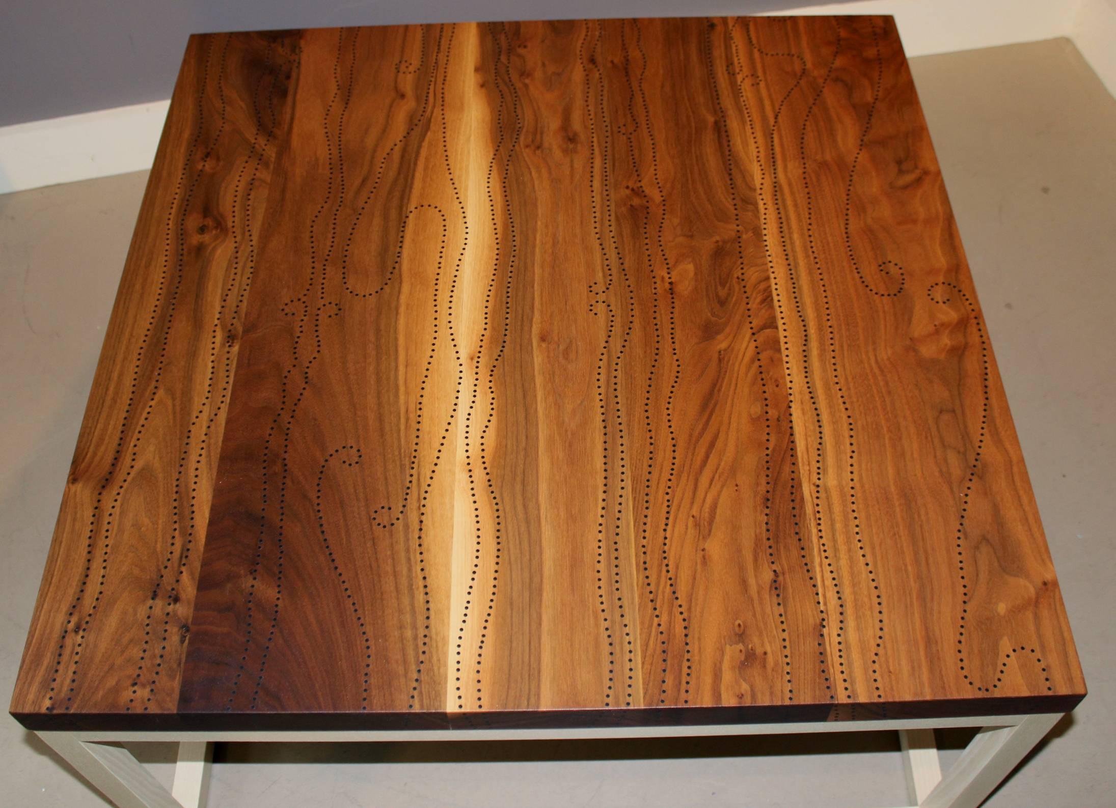 A splendid custom modernist low square nail table in bleached walnut and bleached ash, with delrin rod inlay handcrafted by Peter Sandback. 

Peter Sandback has gained a national reputation for his intricate pattern work of inlaid nails set into