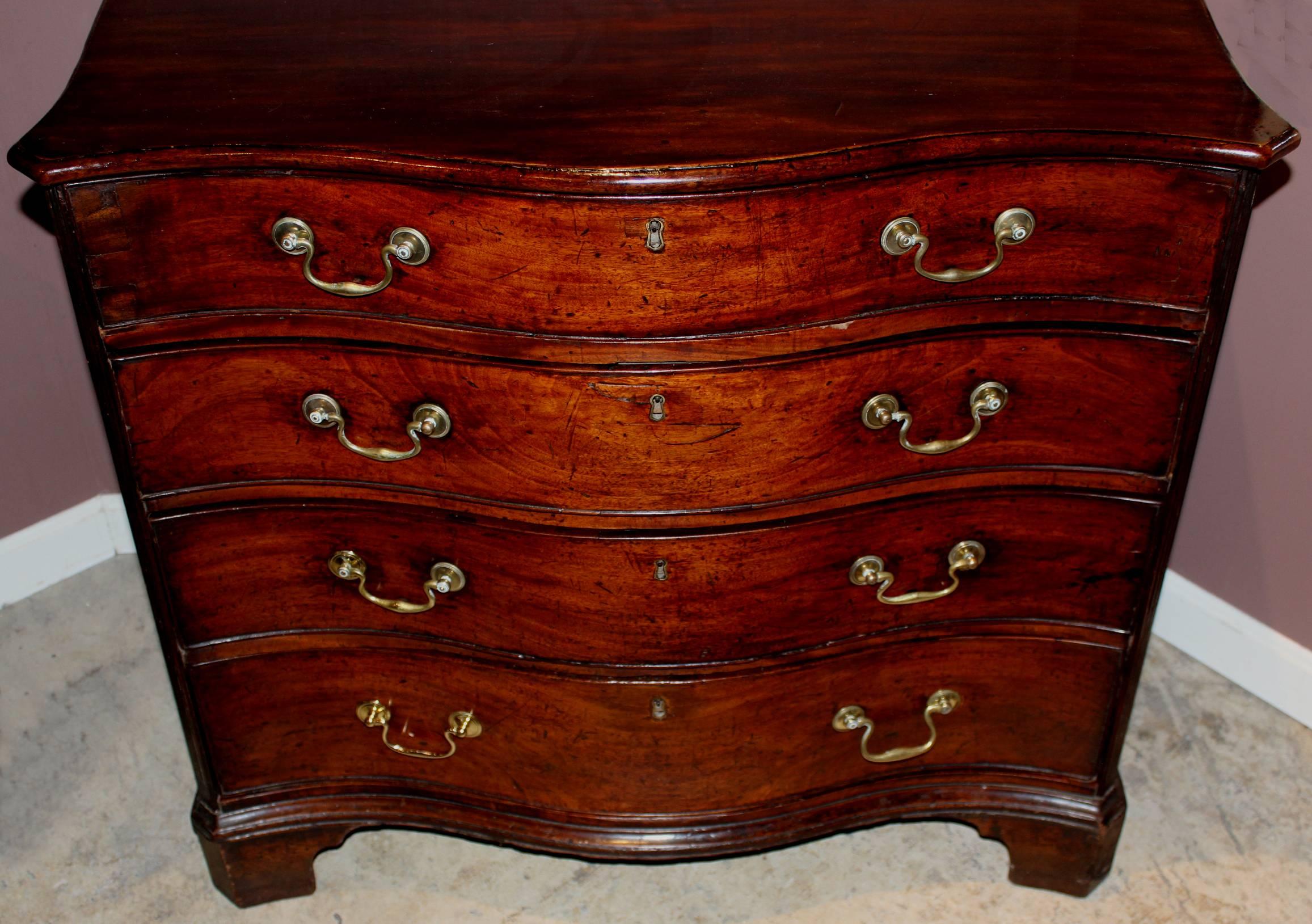 Georgian 18th Century English Mahogany Serpentine Four Drawer Chest of Superb Proportion