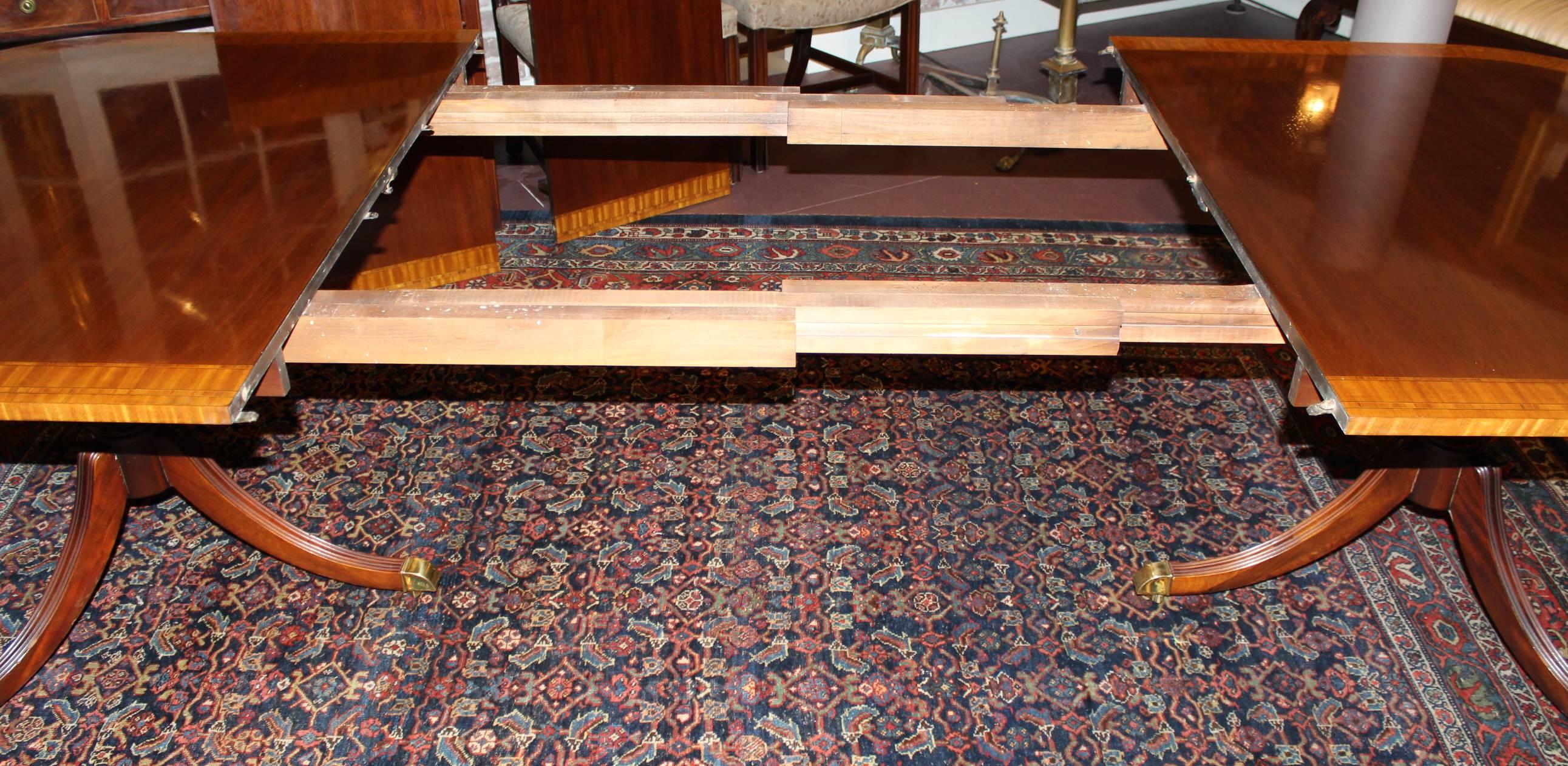 20th Century Splendid Double Banded Mahogany and Satinwood Double Pedestal Dining Table