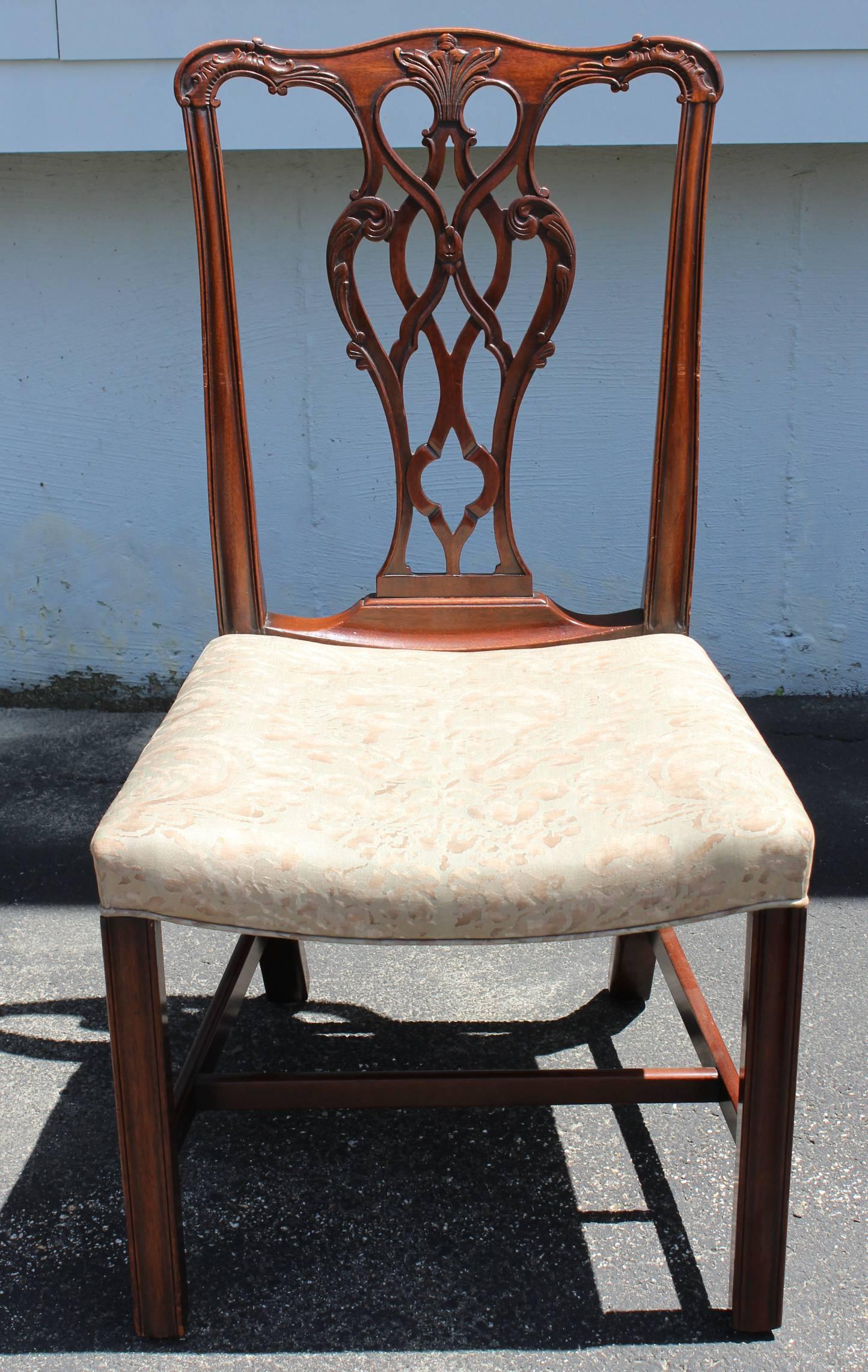 20th Century Set of Eight Mahogany Foliate Carved Chippendale Style Dining Chairs