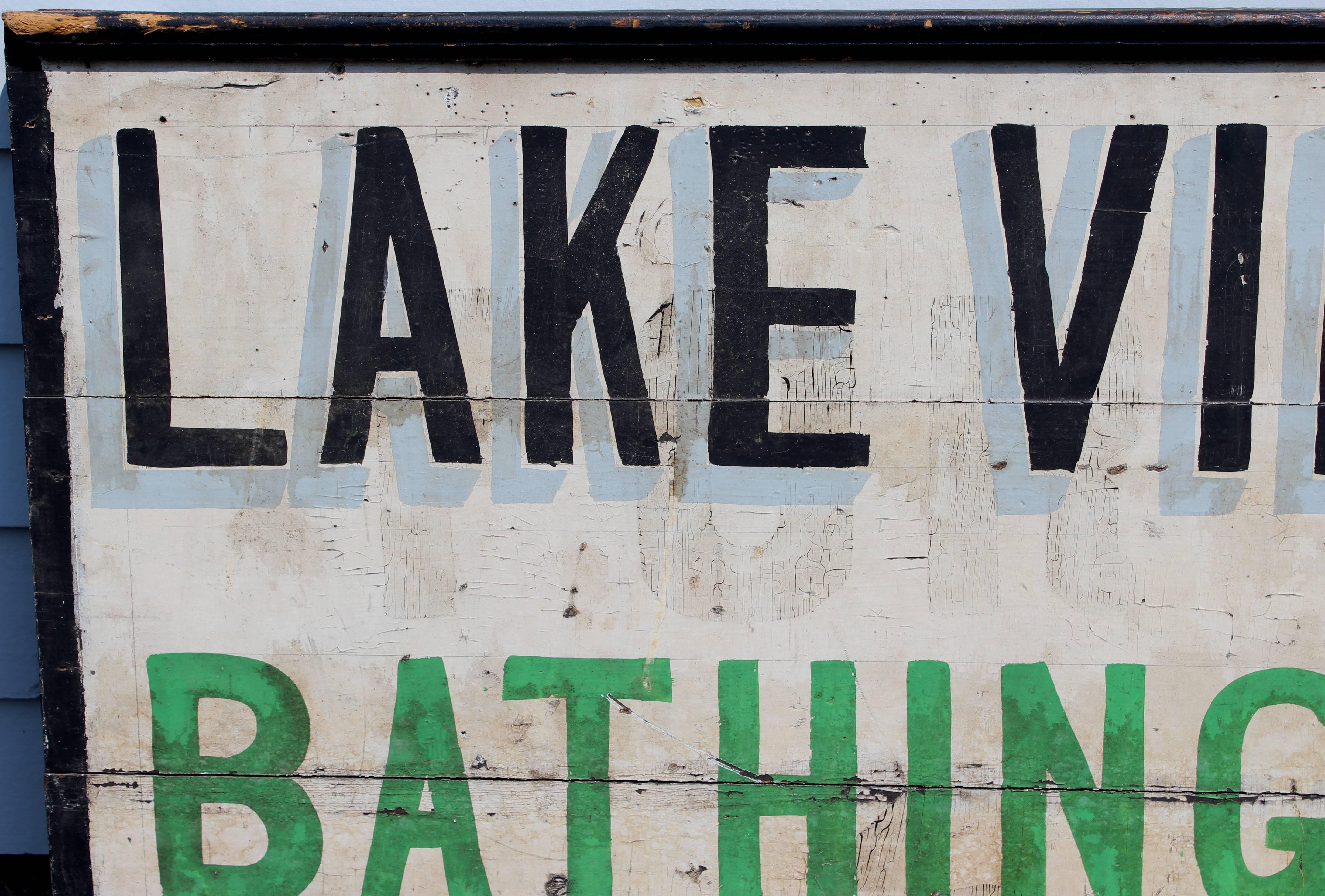 A great wooden hand-painted advertising sign, probably dating from the early-mid-20th century, for Lake View Beach bathing and bath houses, painted on tongue and groove boards, and secured with two support boards on verso. Only one of the four