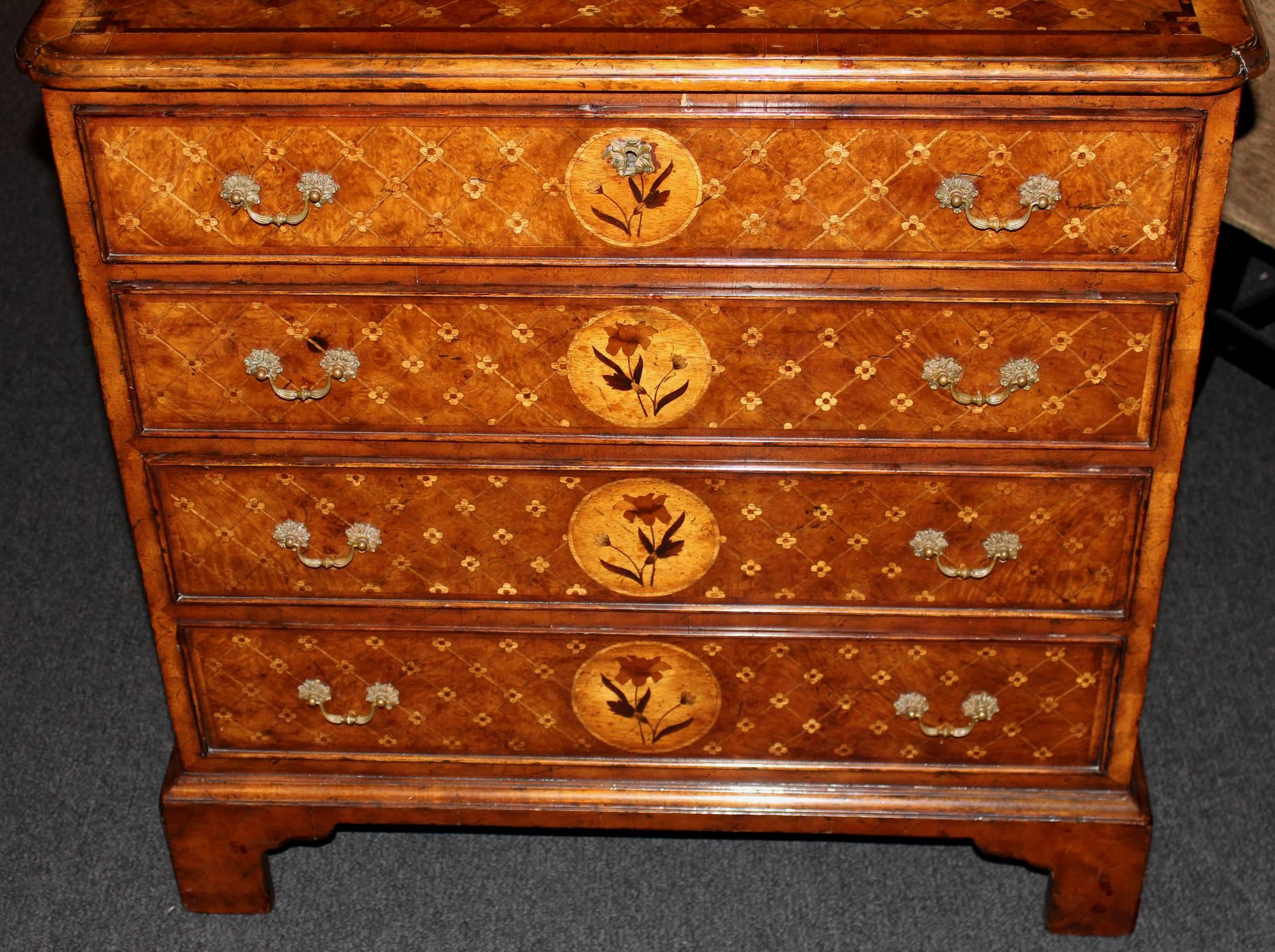 Diminutive English Four-Drawer Chest with Extensive Marquetry In Excellent Condition In Milford, NH