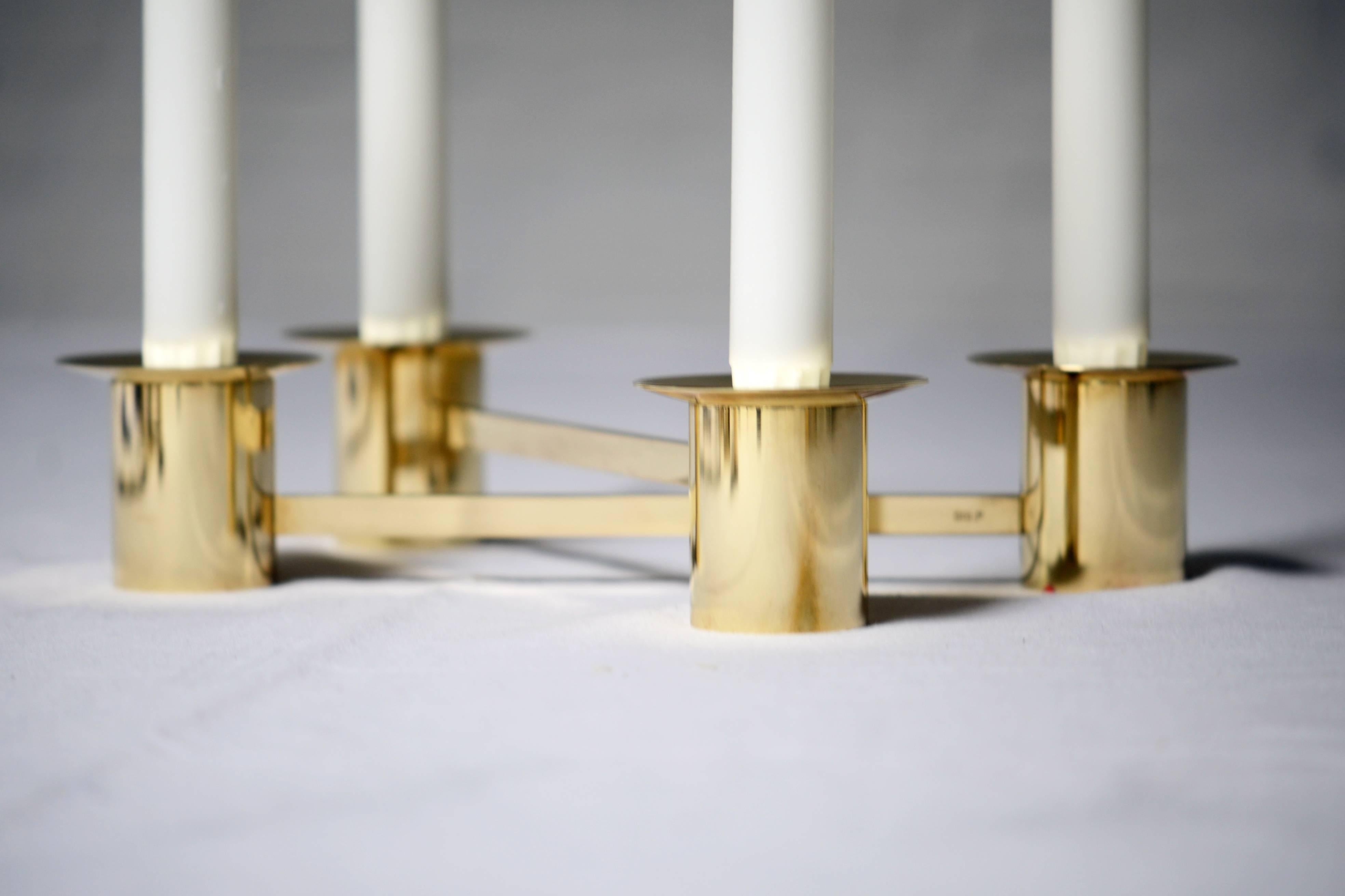 Pair of brass candlesticks.

Sigurd Persson, (1914-2003).
Sigurd Persson began as a silversmith, but over a long path constantly tried new genres and among other things, worked as a glass artist, designer and sculptor. During the 1950s-1960s