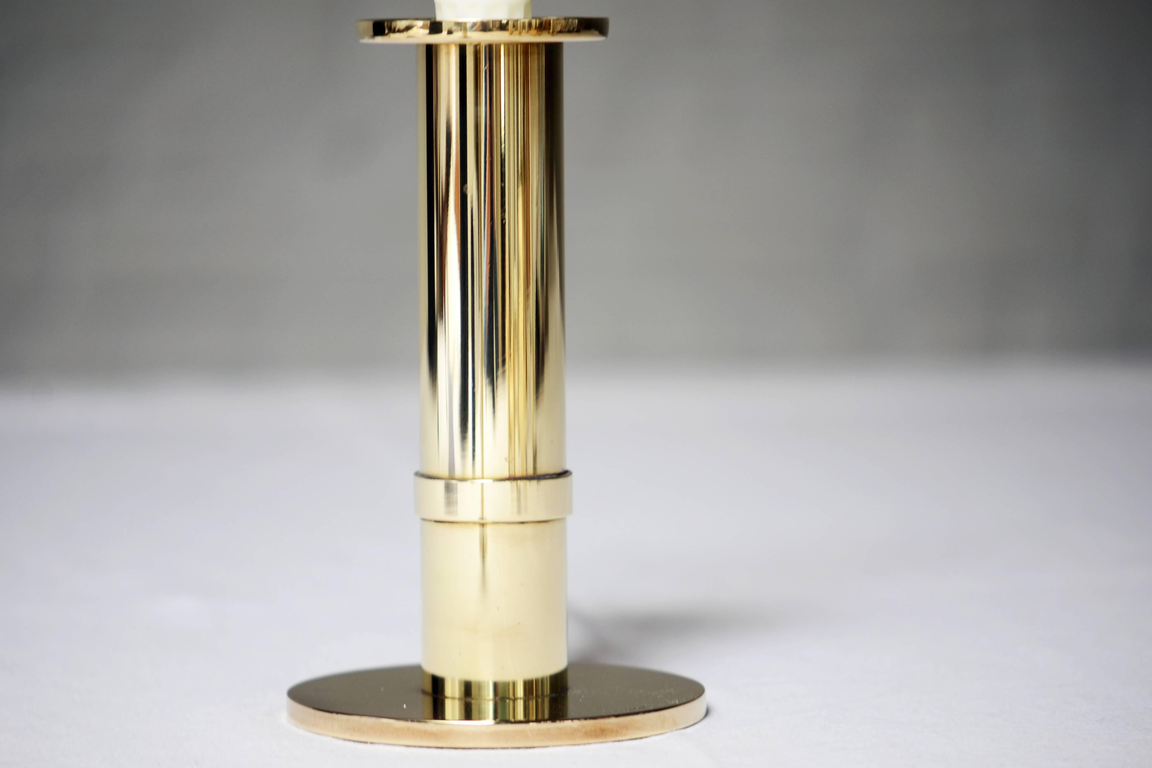 Pair of brass candlesticks.

Sigurd Persson, (1914-2003).
Sigurd Persson began as a silversmith, but over a long path constantly tried new genres and among other things, worked as a glass artist, designer and sculptor. During the 1950 and 1960