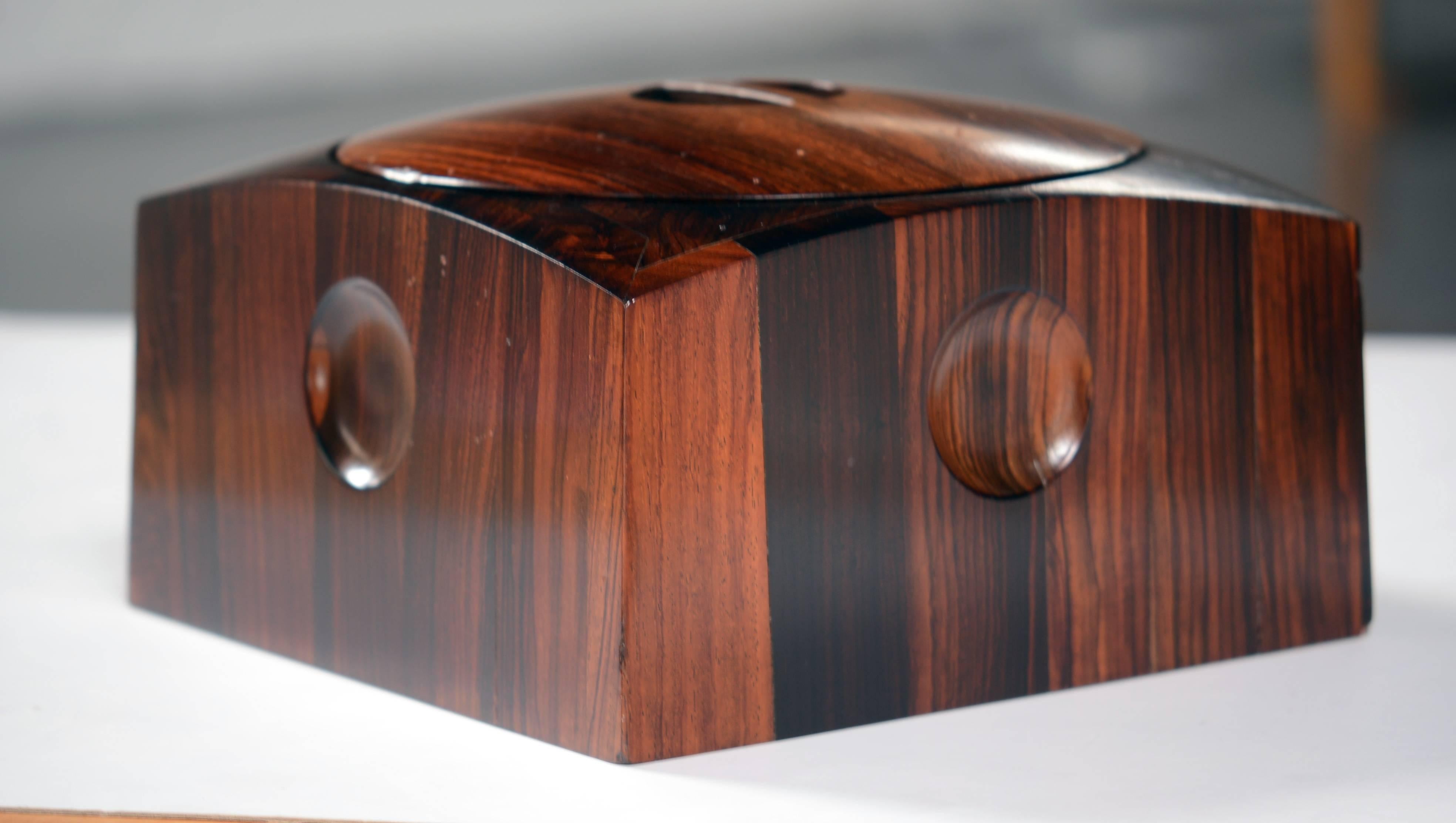 Jens Harald Quistgaard cocobolo ice bucket, Denmark, 1960s

This ice bucket is from the rare woods series that Quistgaard designed with different types of woods. The interior is in plastic and the new exterior varnish is made to resist to the