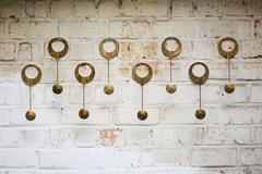 Arthur Pe Eight Round Brass Wall Candlesticks Made by Hand by the Artist, Sweden