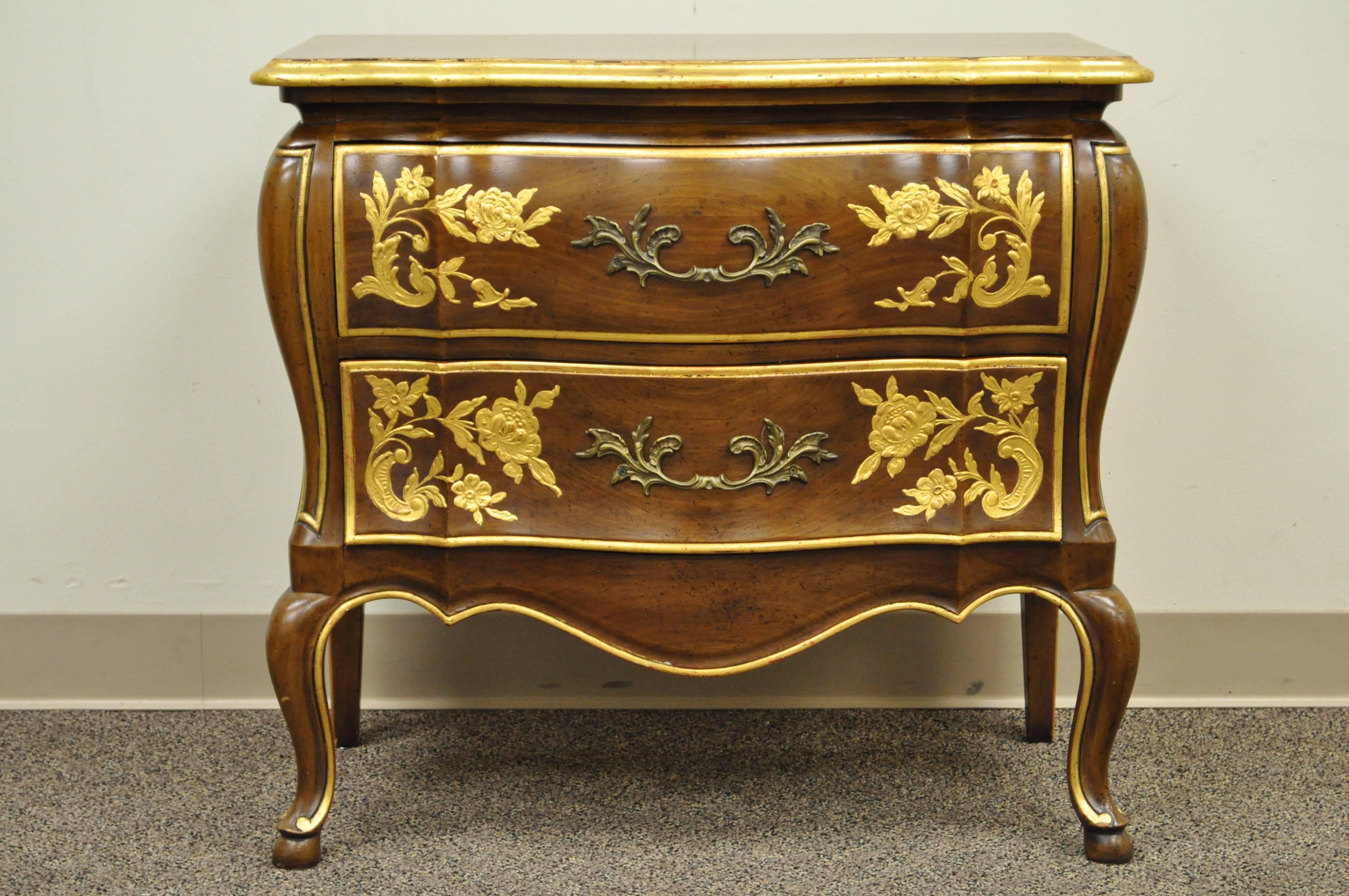Fabulous two-drawer vintage bombe form commode by John Widdicomb. Chest features two very thick solid cherry wood dovetailed drawers, hand-painted gold gilt chinoiserie designed accents, elegant French Louis XV form, and clean shapely lines.