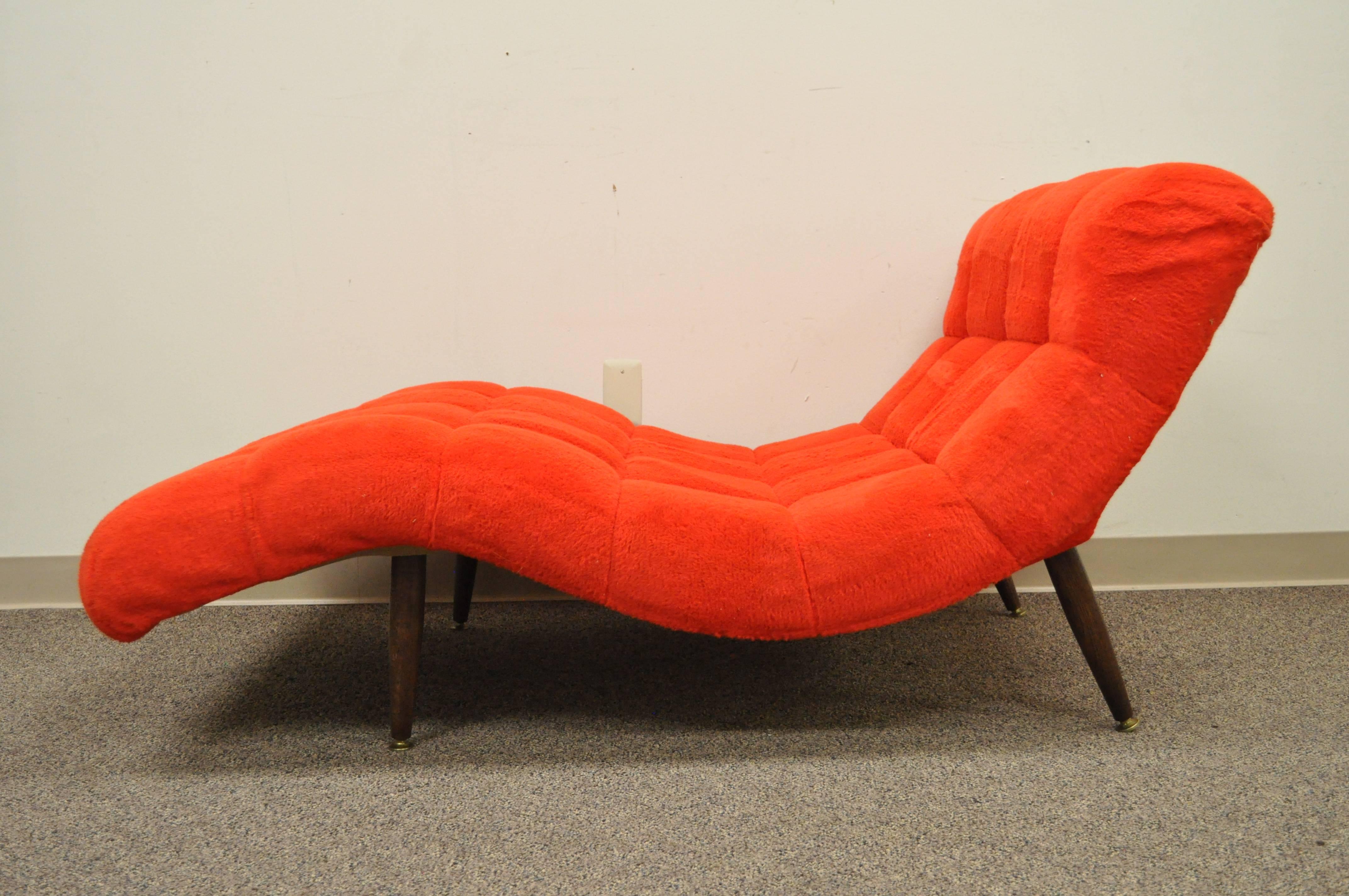 Very cool vintage, Mid-Century Modern, wave form chaise lounge in the style of Adrian Pearsall for Craft Associates. This item features a very nice wide profile, removable tapered walnut legs and great modernist form.