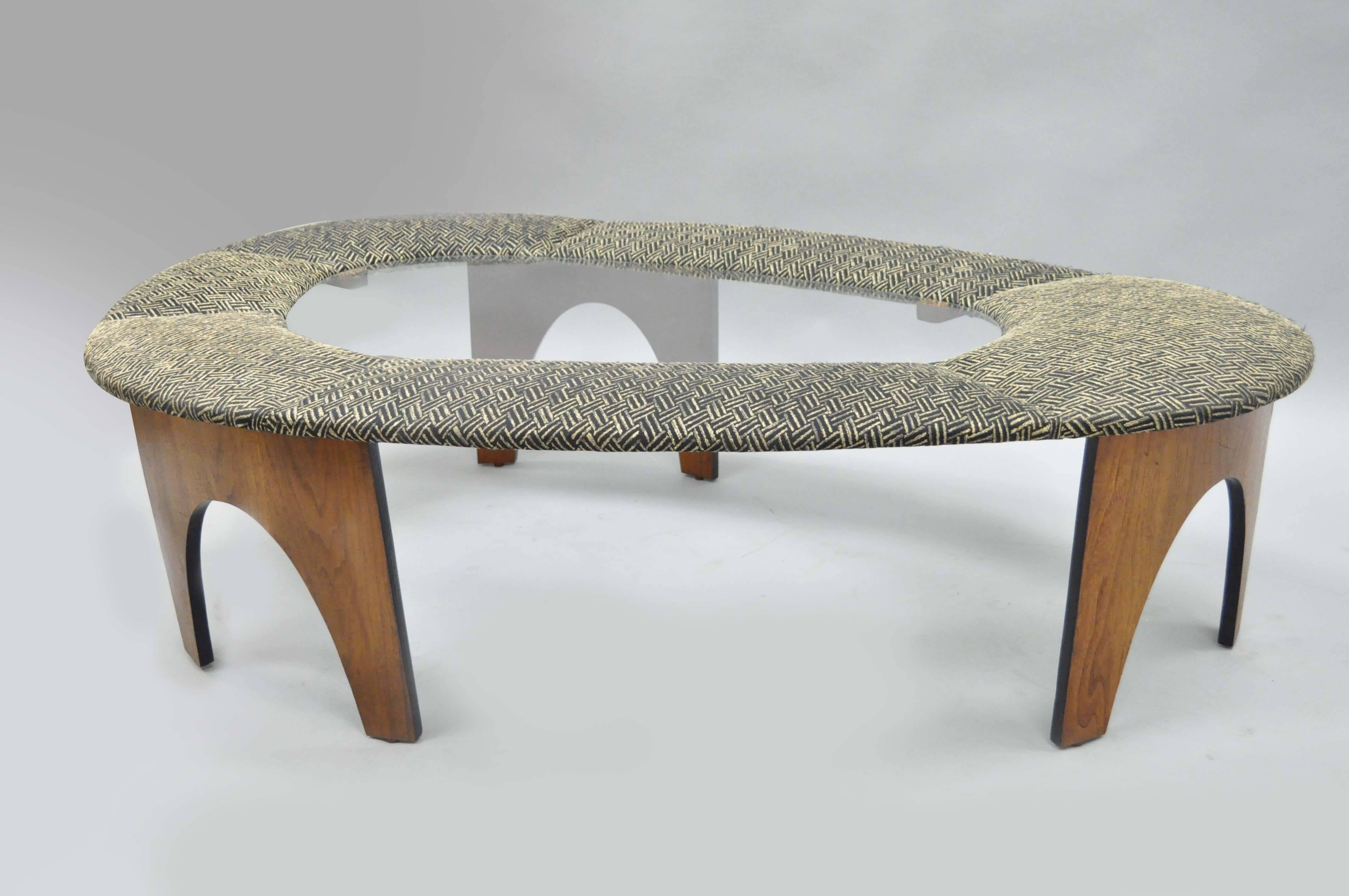 Very rare Mid-Century Modern arched coffee table by Henry P glass from the intimate island suite for The Richbilt Furniture Co. Item features walnut veneer arched legs over a bent plywood frame, beautiful wood grain throughout, upholstered top and