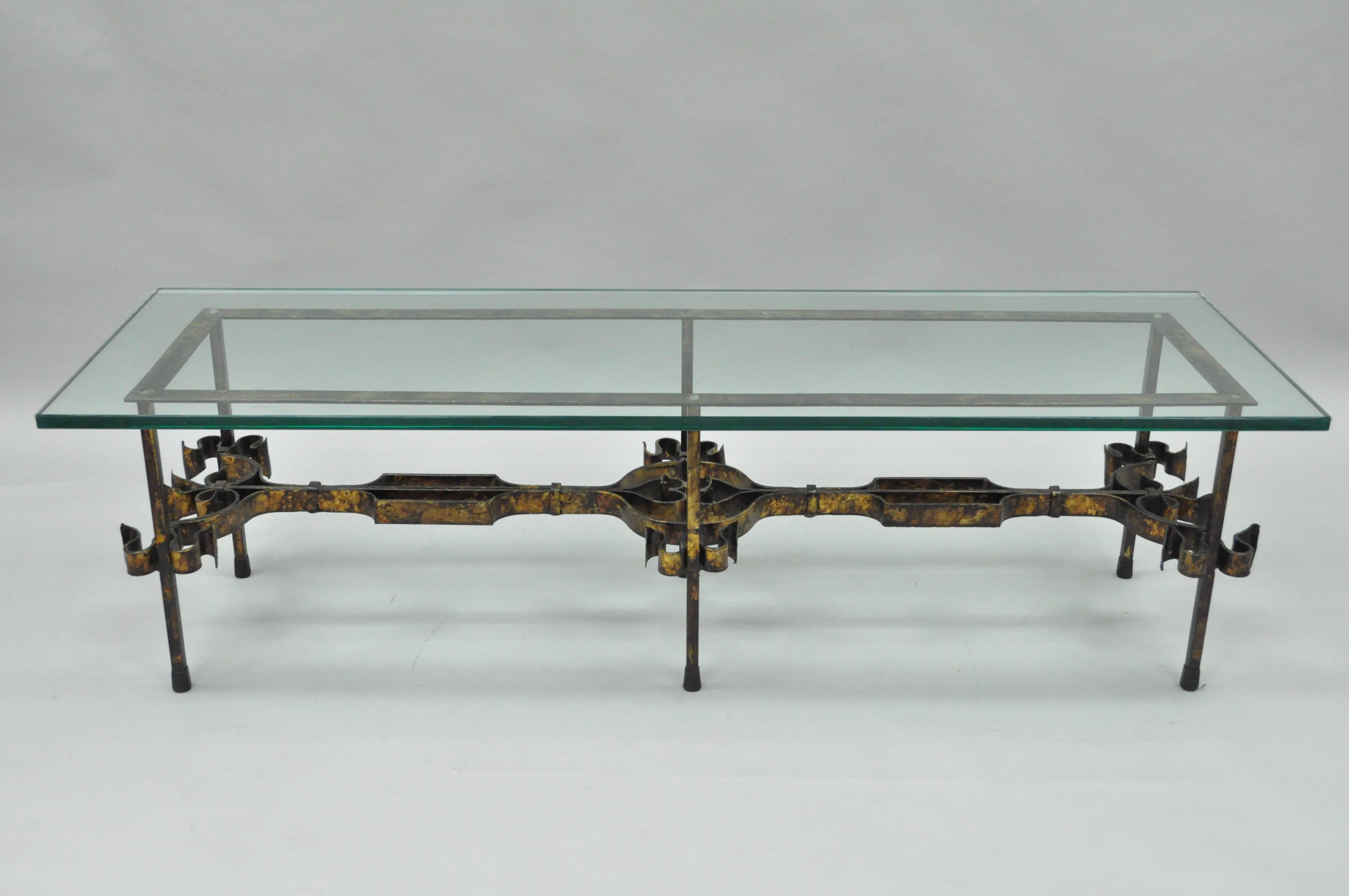 Great quality vintage Hollywood Regency/Brutalist coffee table. Item features a substantial .75