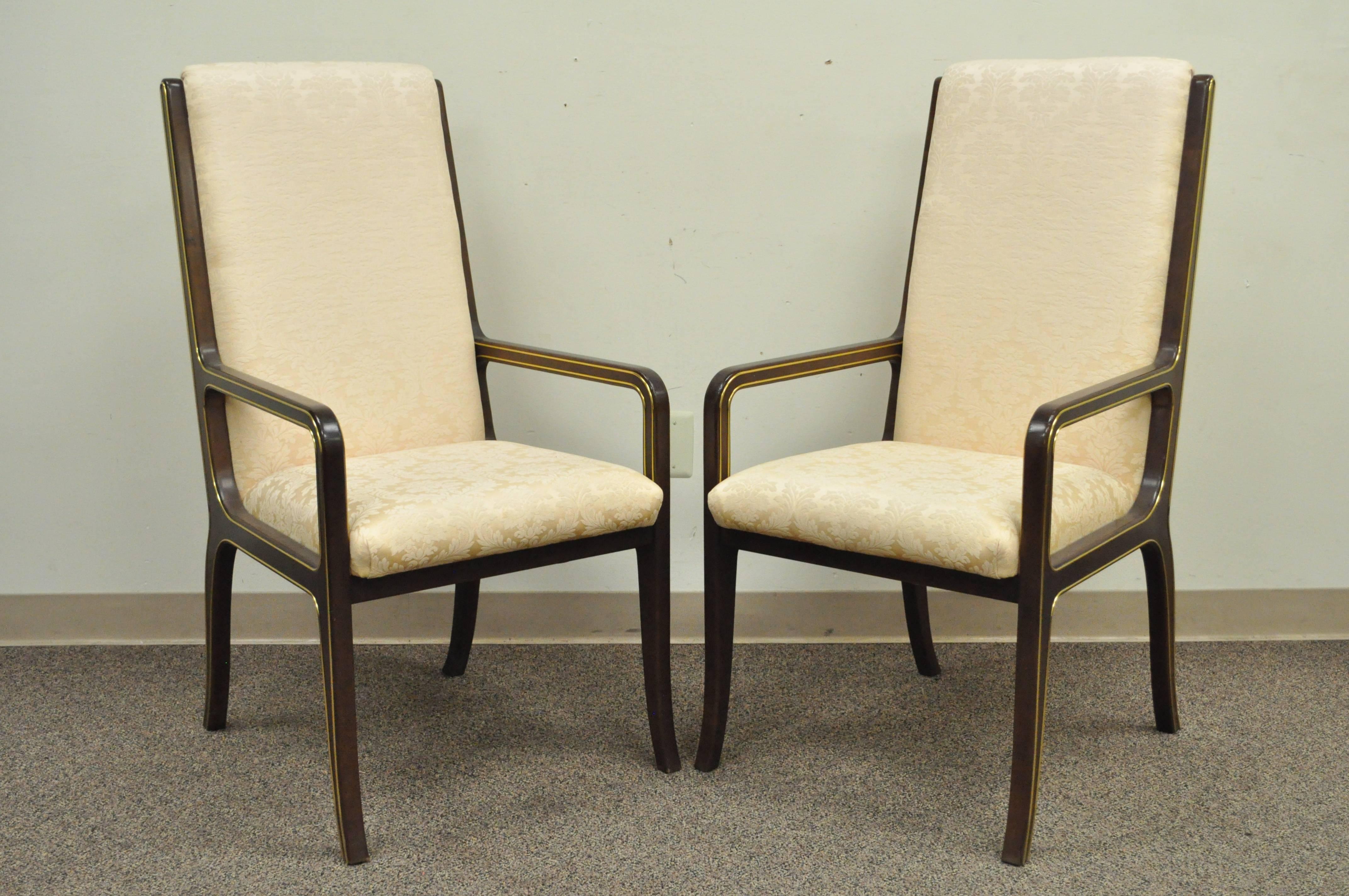 Set of eight high quality Mastercraft for Baker Furniture Co. Mid-Century modernist dining chairs. Set consists of two armchairs and six side chairs. Each chair features sculptural solid wood frames (believed to be solid mahogany) with brass inlaid