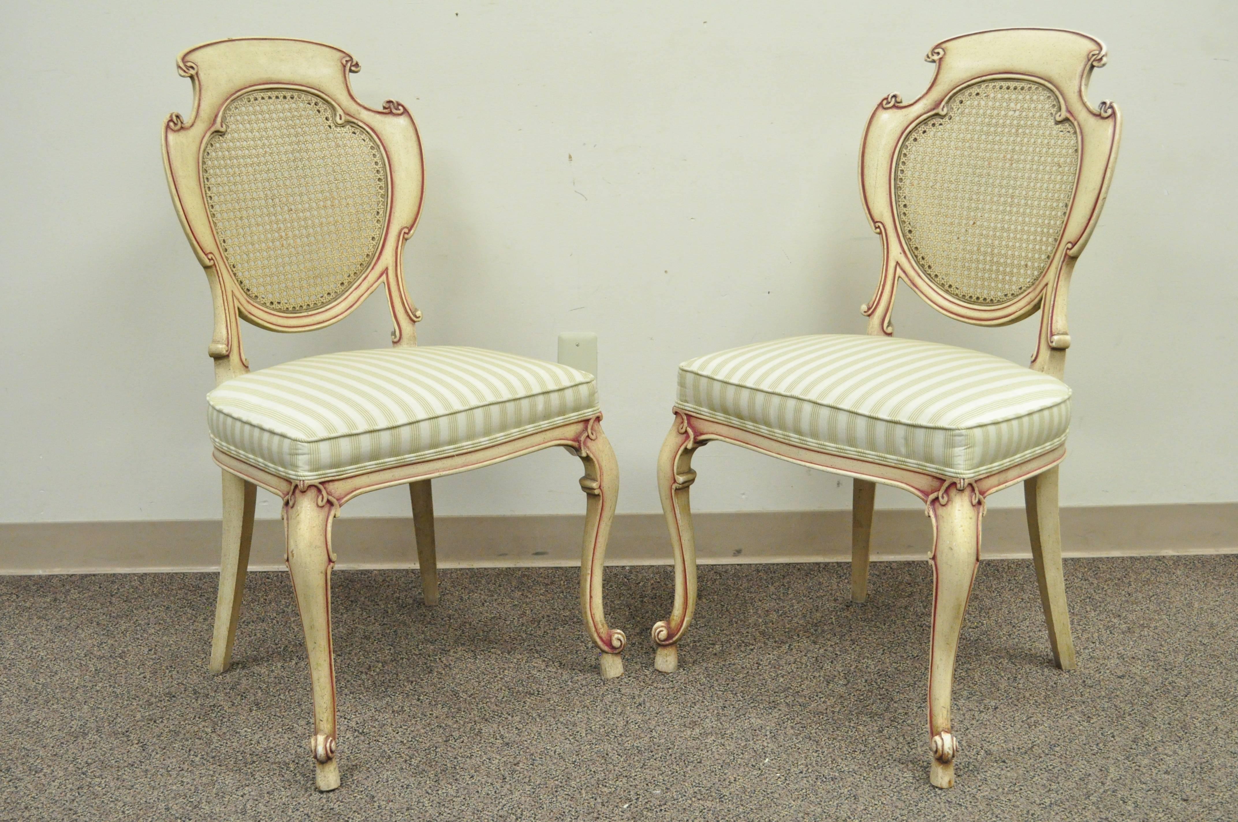 Four Scroll Carved Italian Hollywood Regency Cream Pink Cane Back Dining Chairs In Good Condition In Philadelphia, PA