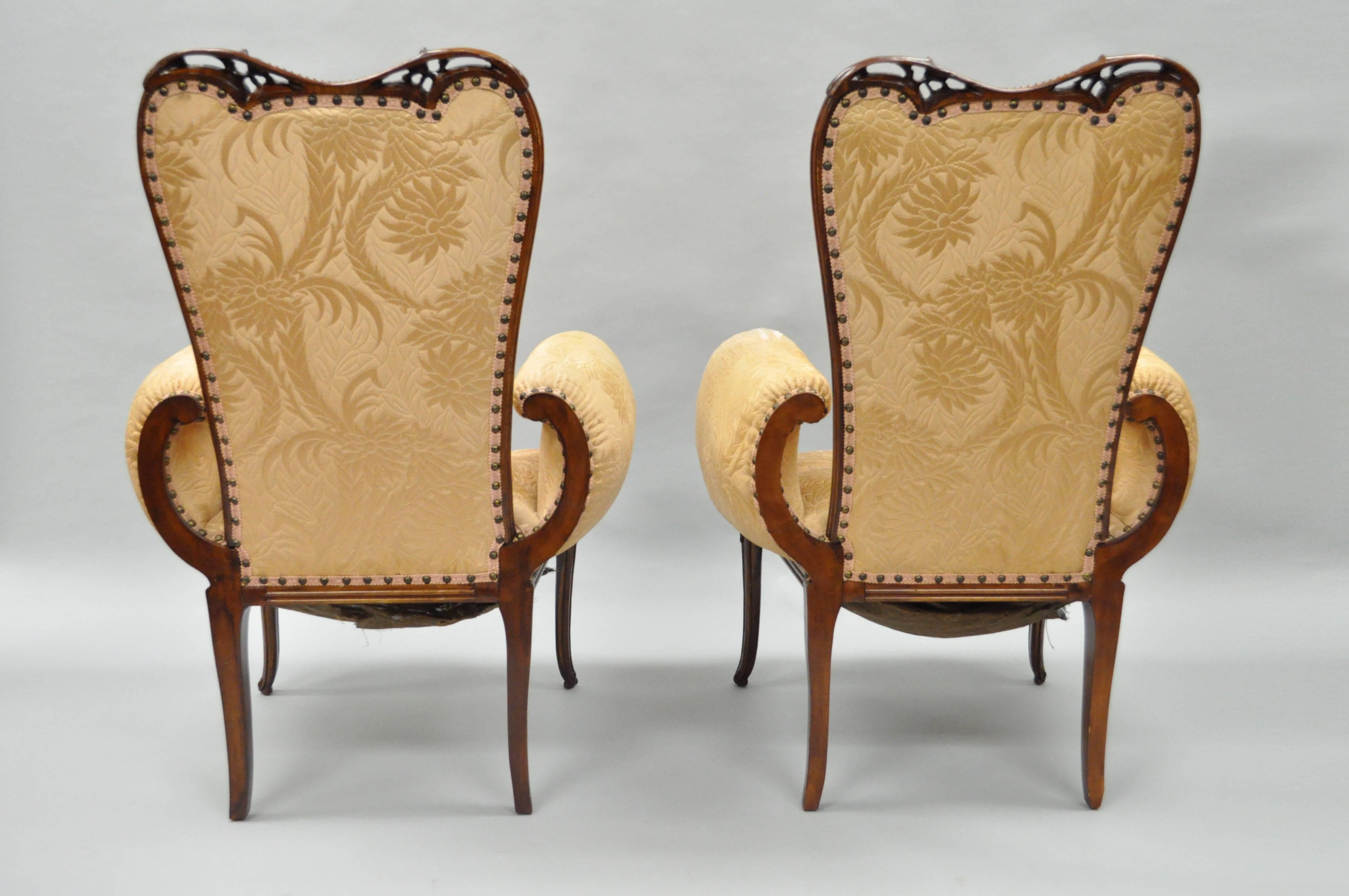 Pair of Carved Mahogany French Hollywood Regency Fireside Chairs Grosfeld House In Fair Condition For Sale In Philadelphia, PA